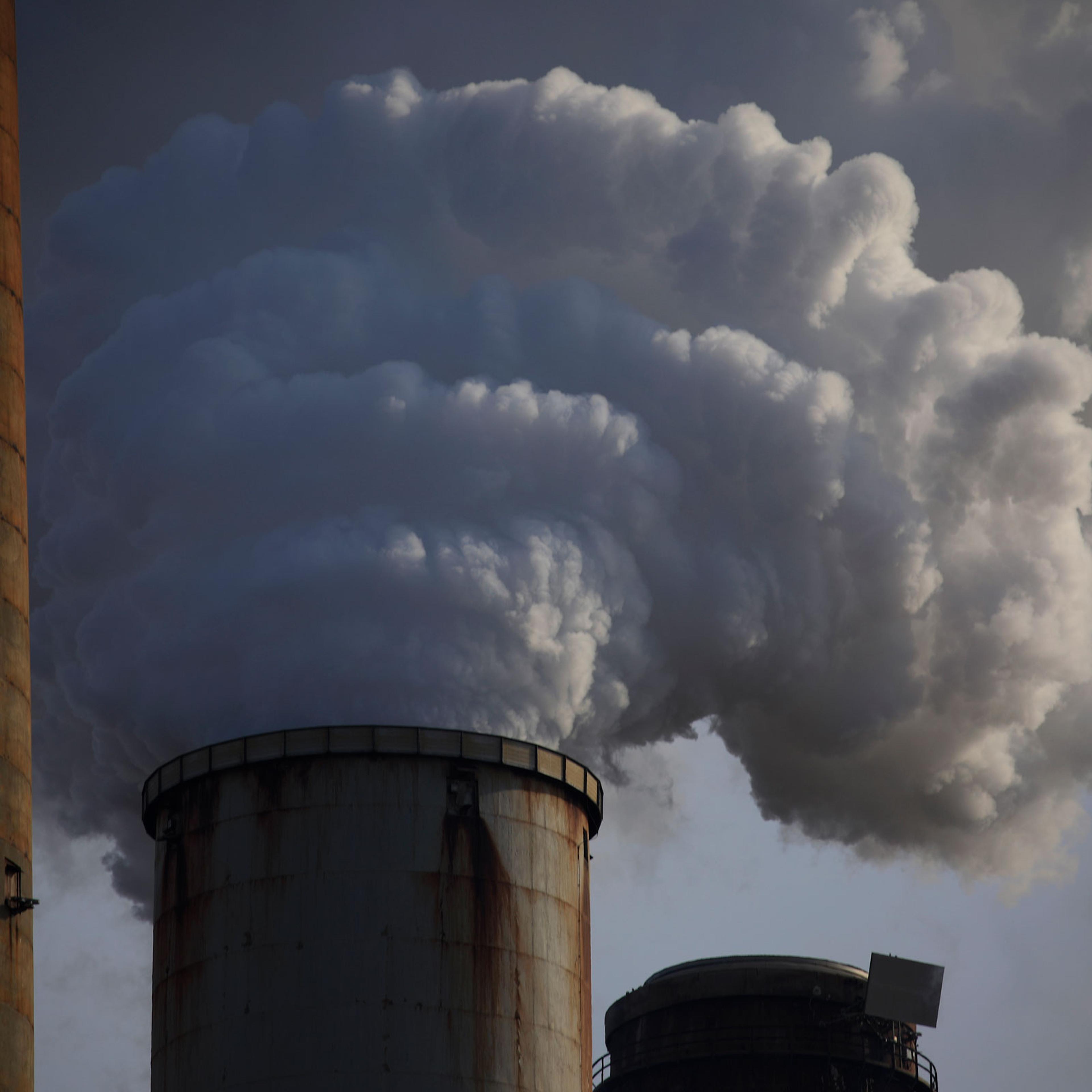 Emissions rise from the Kentucky Utilities Co. Ghent generating station in Ghent, Kentucky