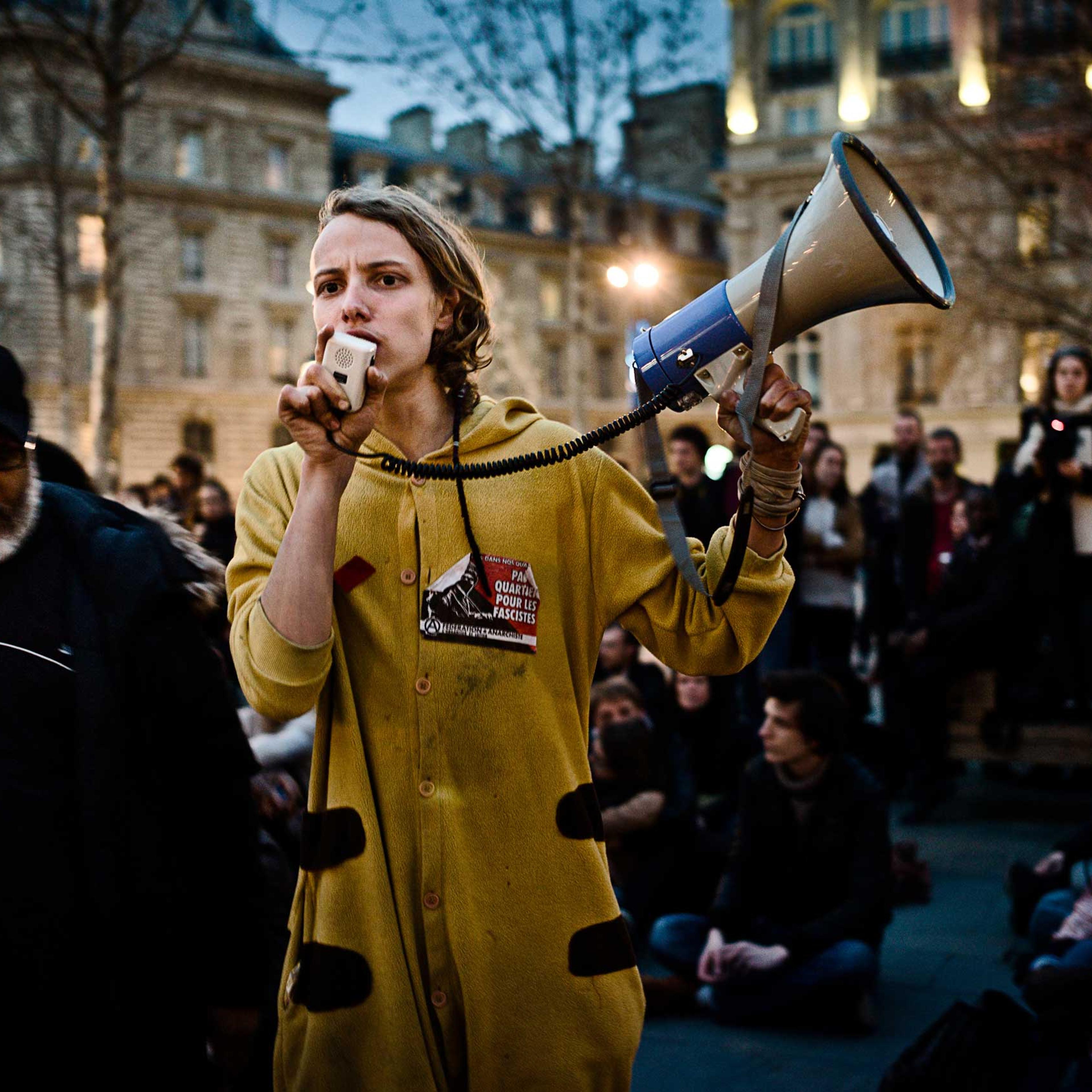 A representative of the Nanterre University students, speaks to the crowds in the Place de la République.