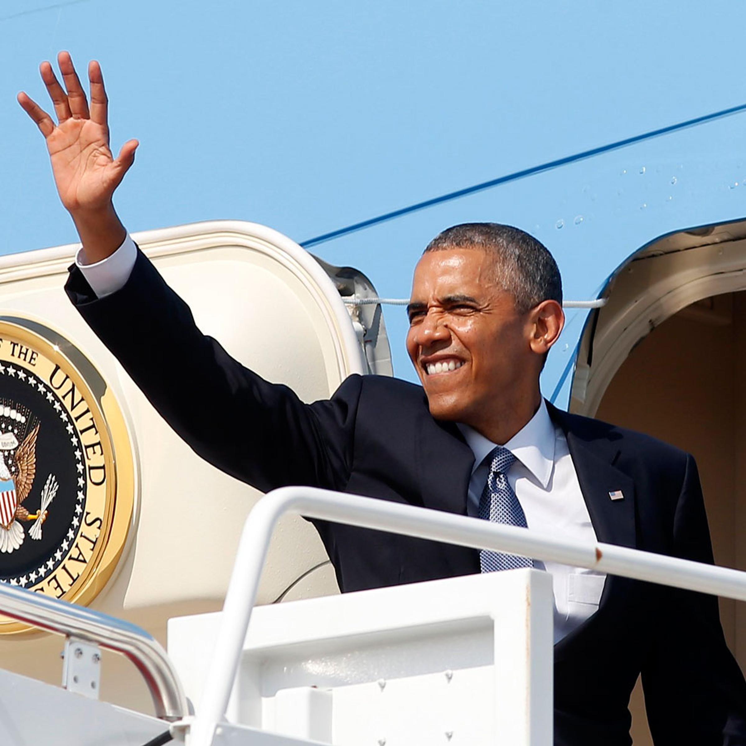 Obama waves from Air Force One as he departs Joint Base Andrews in Washington en route to Denver