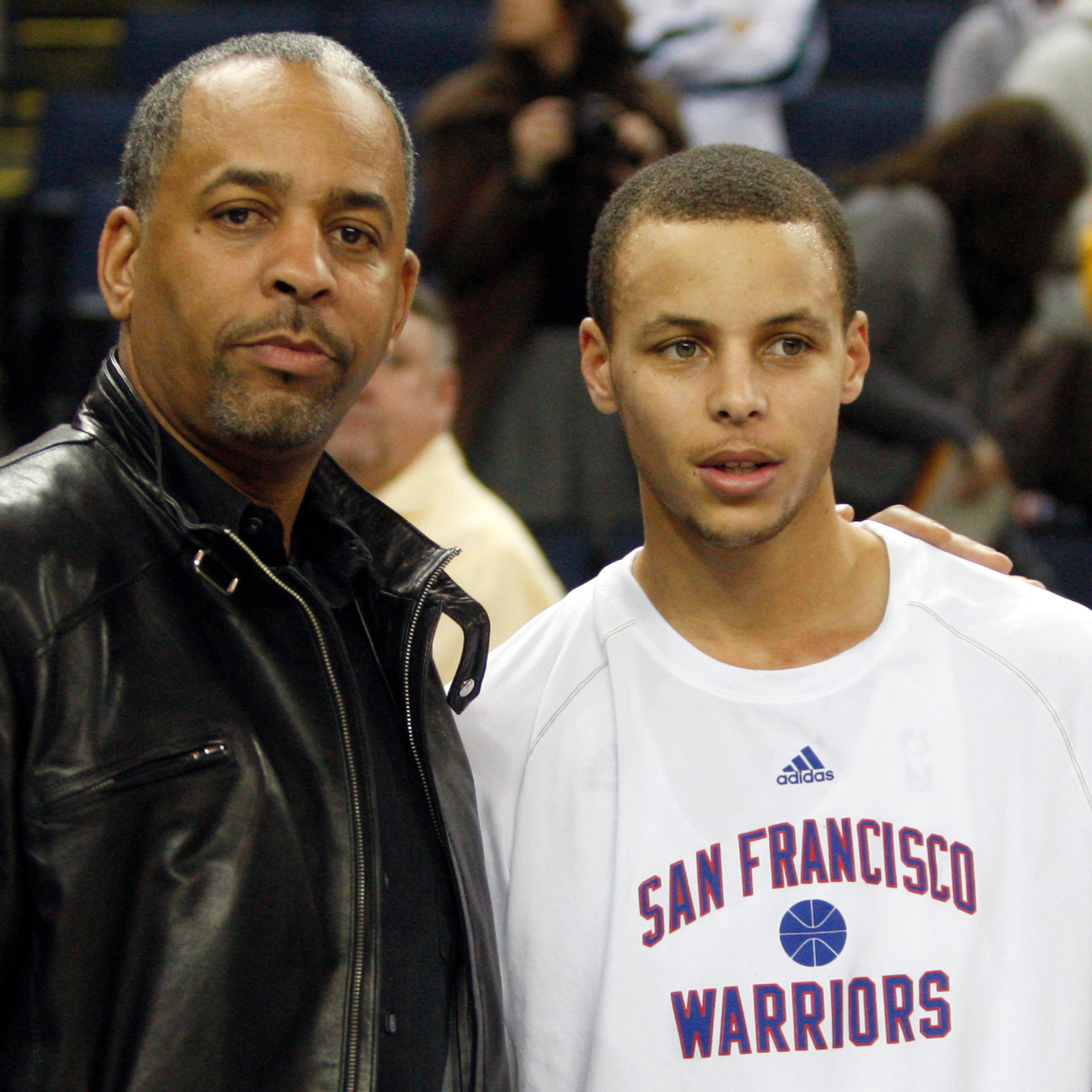 Stephen Curry (R), of Golden State Warriors, stands beside his father, Dell Curry, prior to a game against the New Orleans Hornets in Oakland, Calif on Jan. 27, 2010.