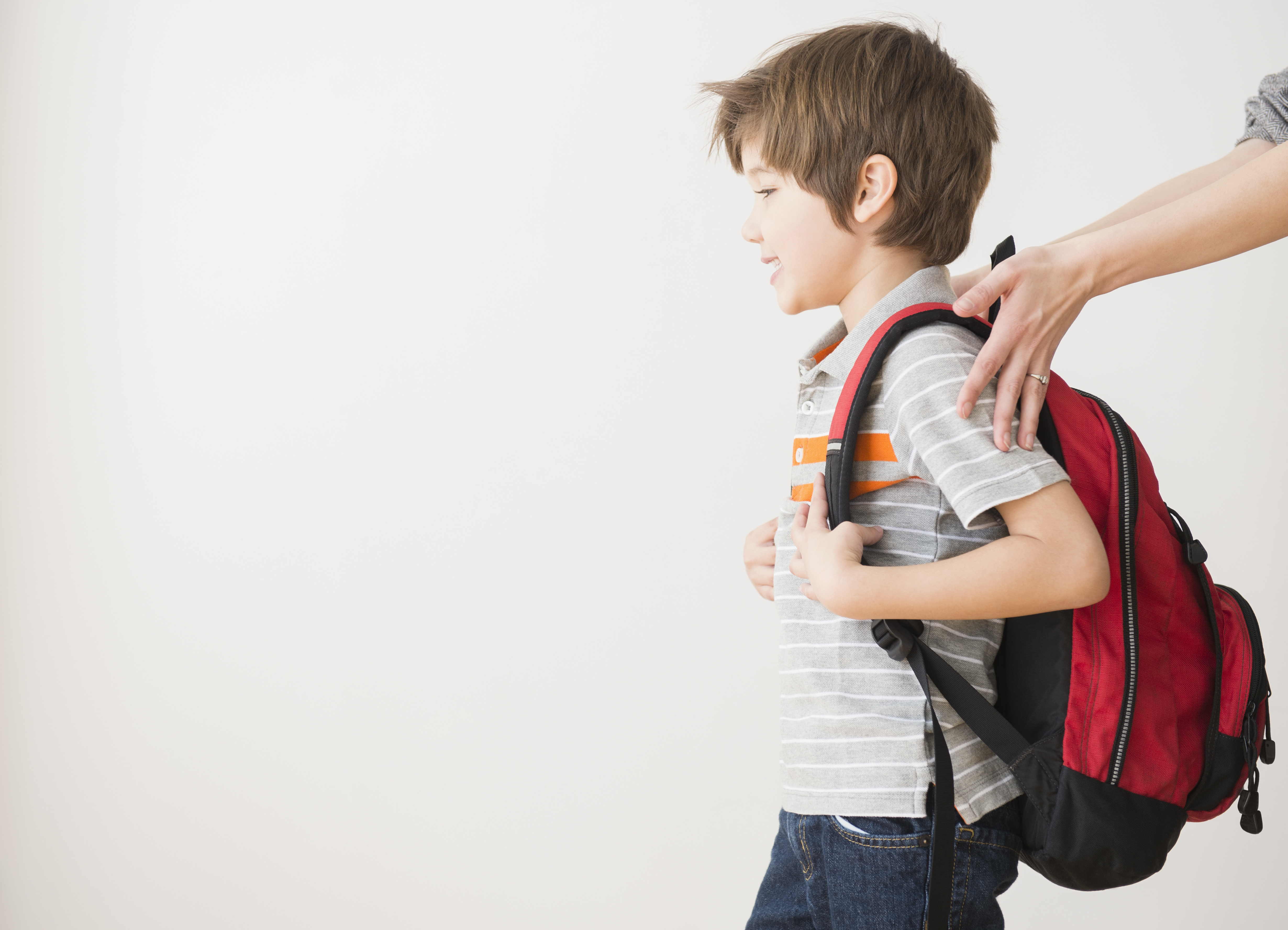 mother rushing son to school