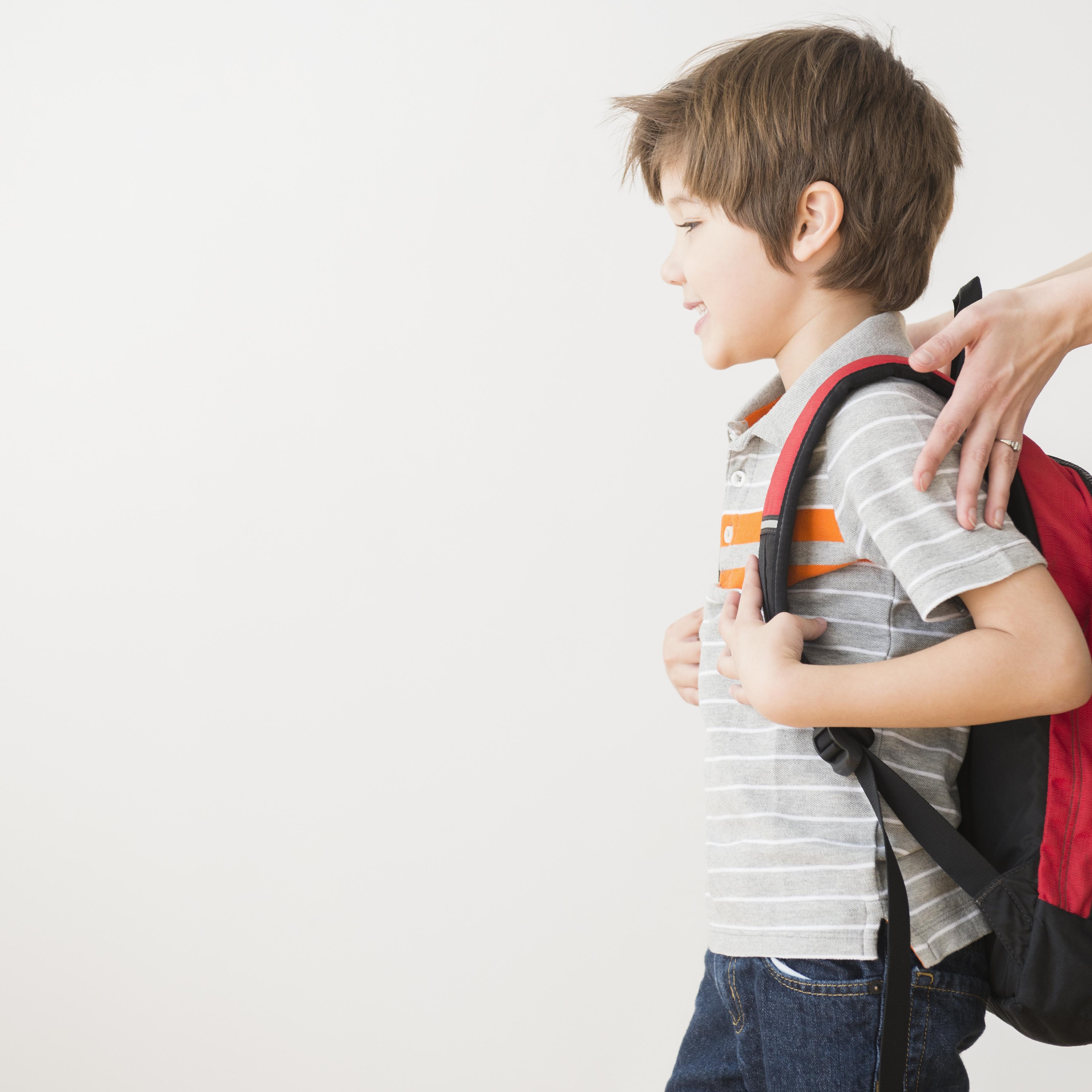 mother rushing son to school