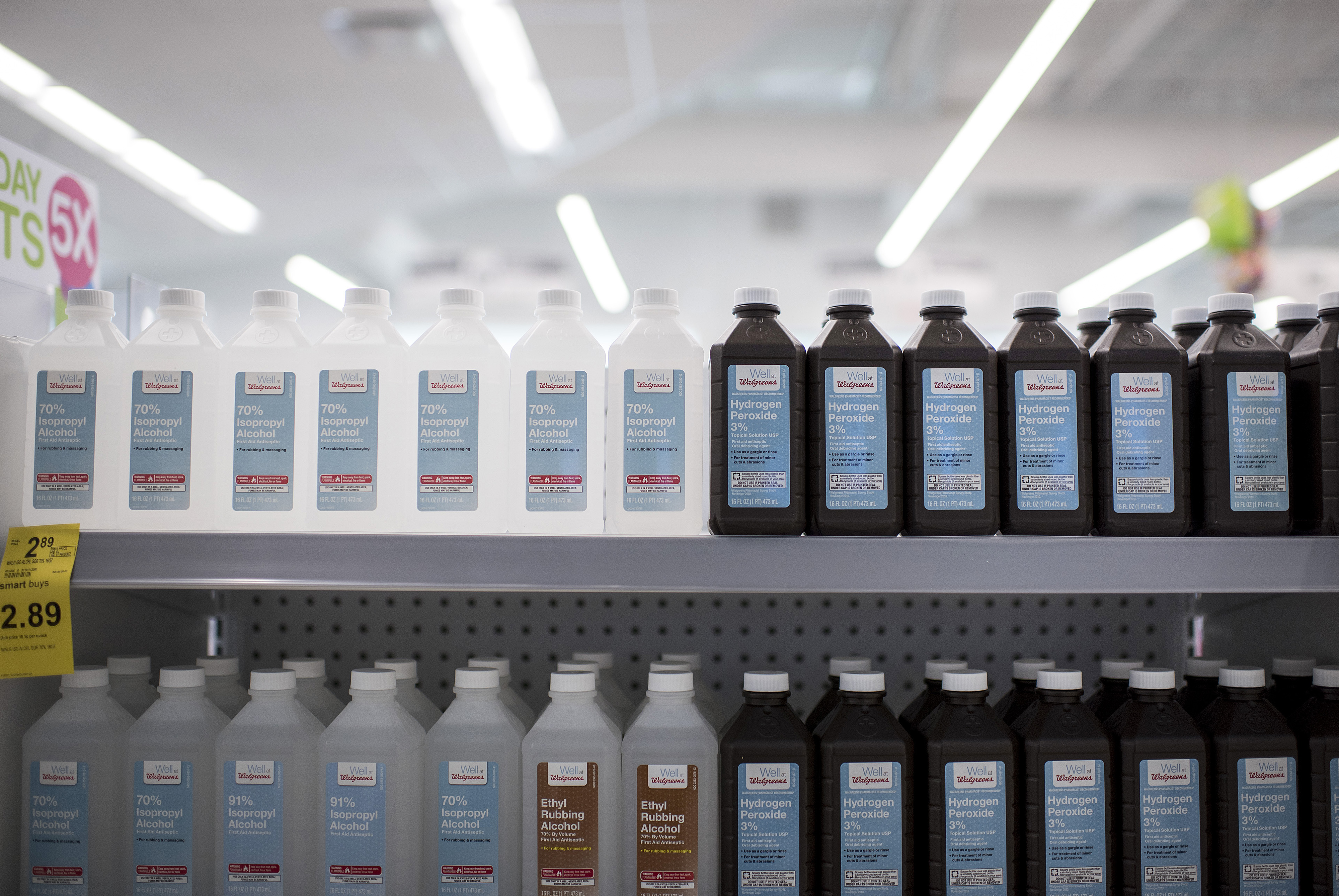 Bottles of rubbing alcohol and hydrogen peroxide are displayed for sale at a Walgreens Boots Alliance Inc. store in Elmwood Park, Illinois, U.S., on Tuesday, April 5, 2016.