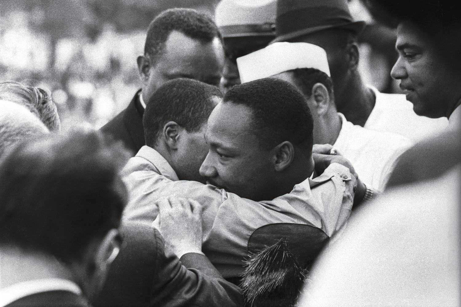 Martin Luther King Jr. is congratulated immediately after delivering his famed "I Have A Dream" speech during the March on Washington, Aug. 28, 1963.