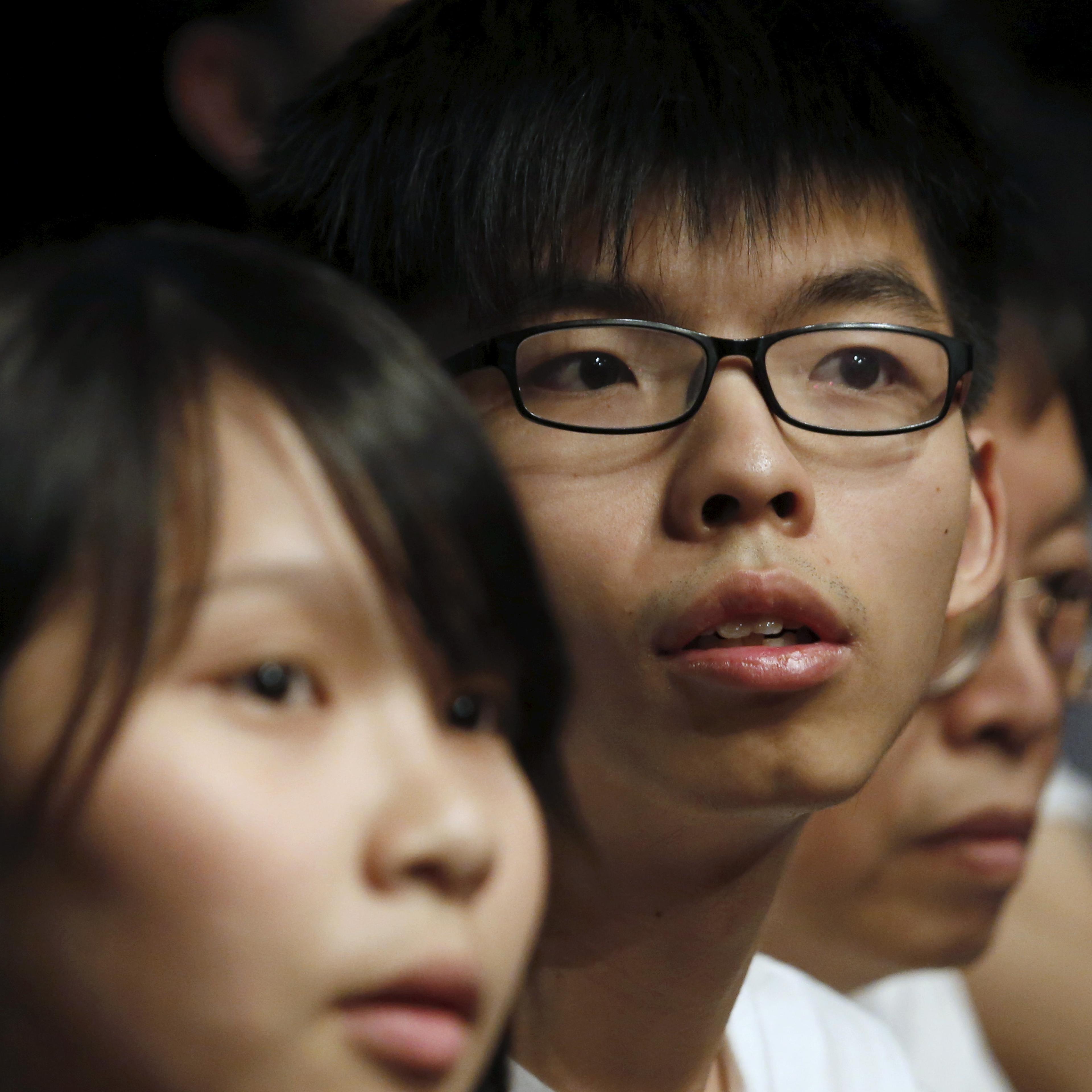 Student leaders Joshua Wong and Agnes Chow attend the launching ceremony of their new political party Demosisto in Hong Kong