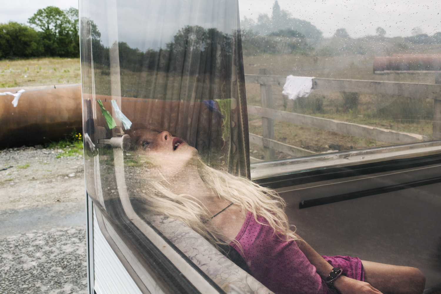 Pamela seen in the caravan. From the series, The Travellers.