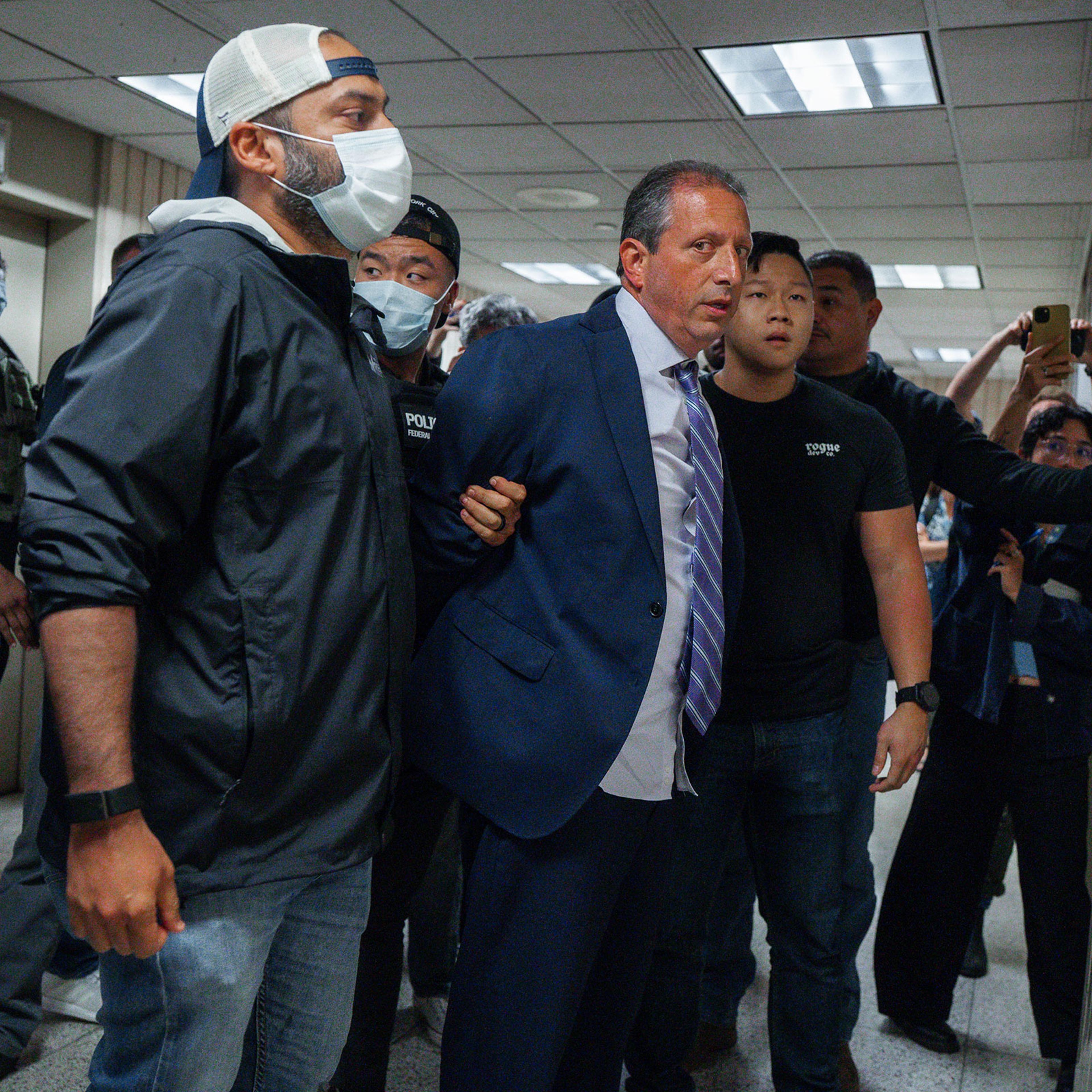 New York City Comptroller Brad Lander is placed under arrest by Immigration and Customs Enforcement and FBI agents outside federal immigration court in New York on June 17, 2025.