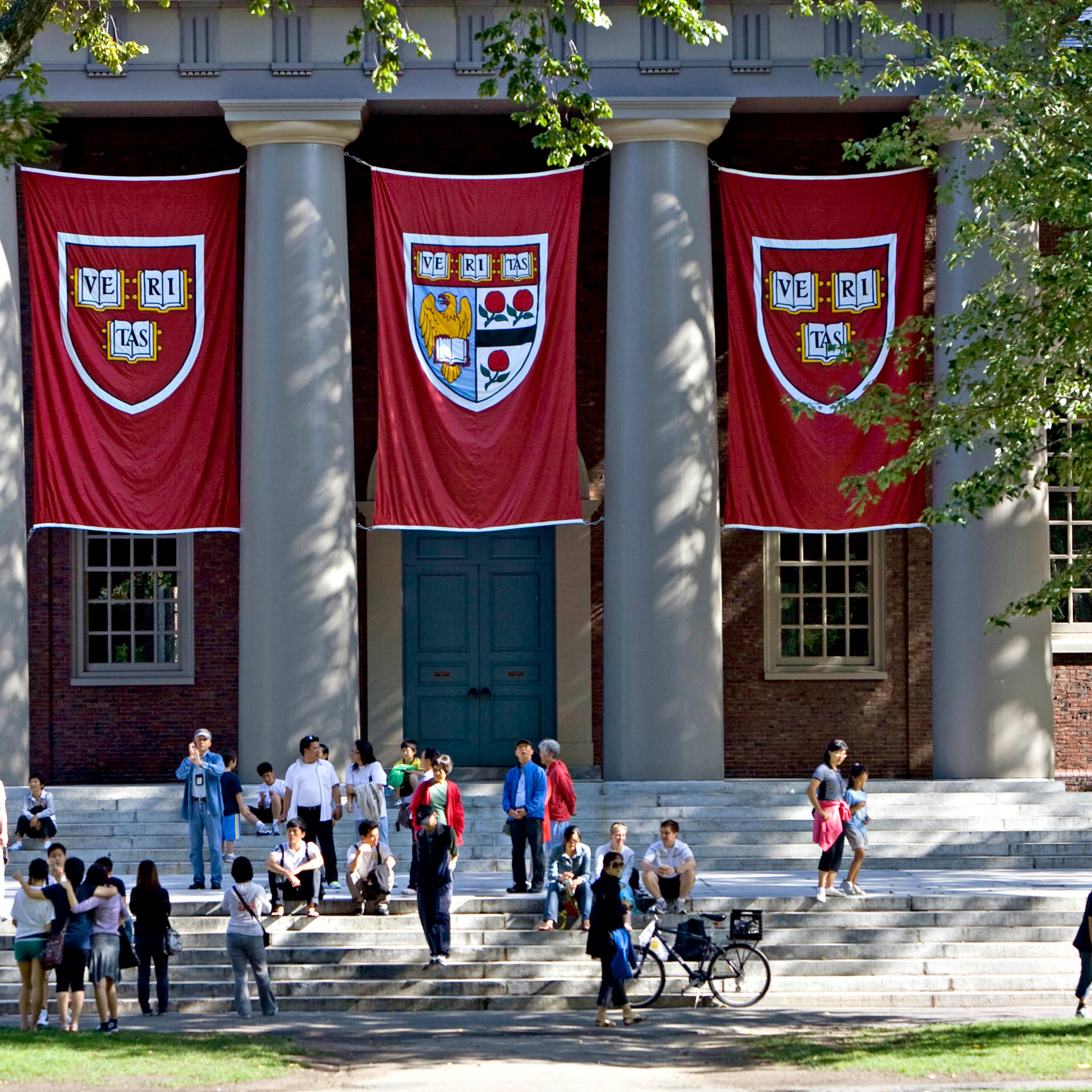 Harvard banners hang outside Memorial Church on the Harvard