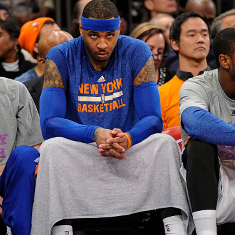 Carmelo Anthony sits on the bench at Madison Square Garden on Feb. 3, 2015.