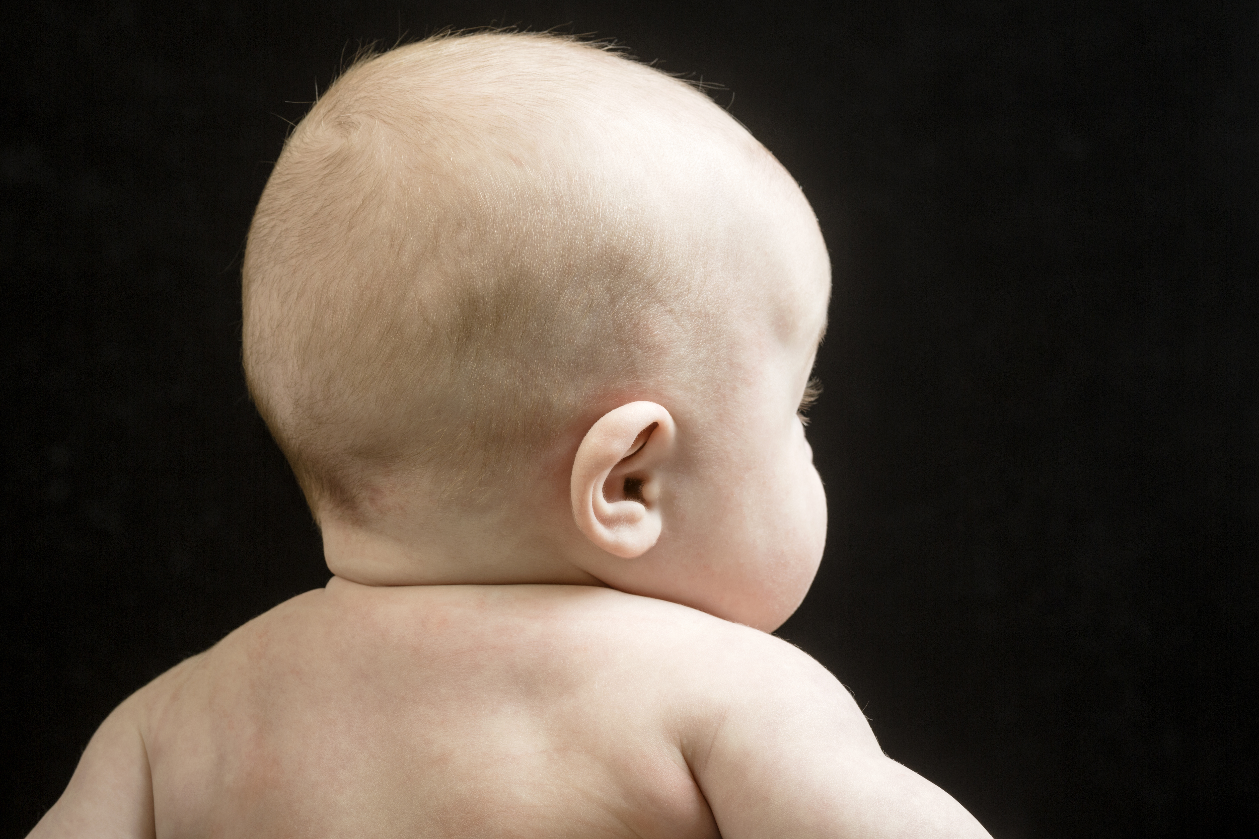 Rear view of baby girl