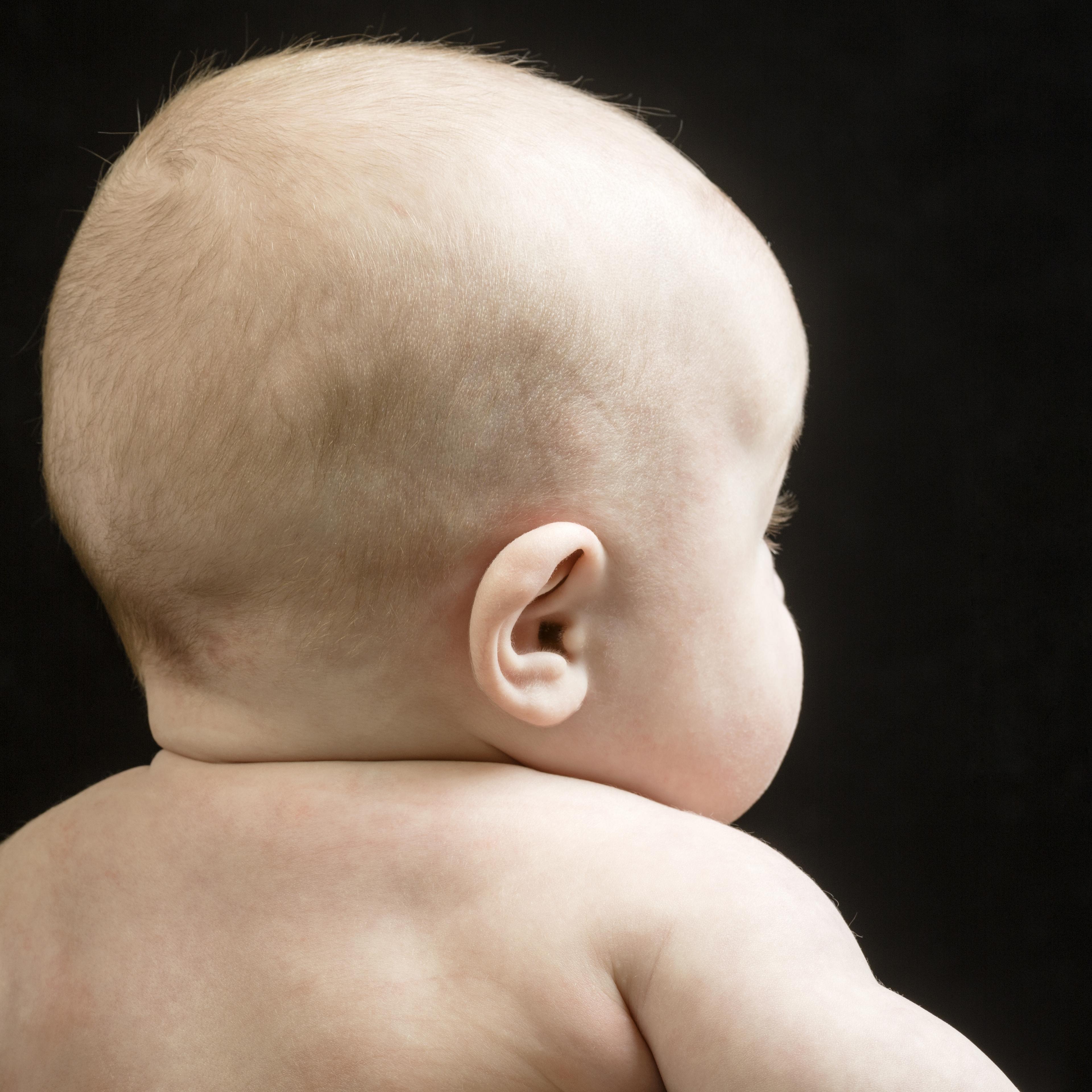 Rear view of baby girl