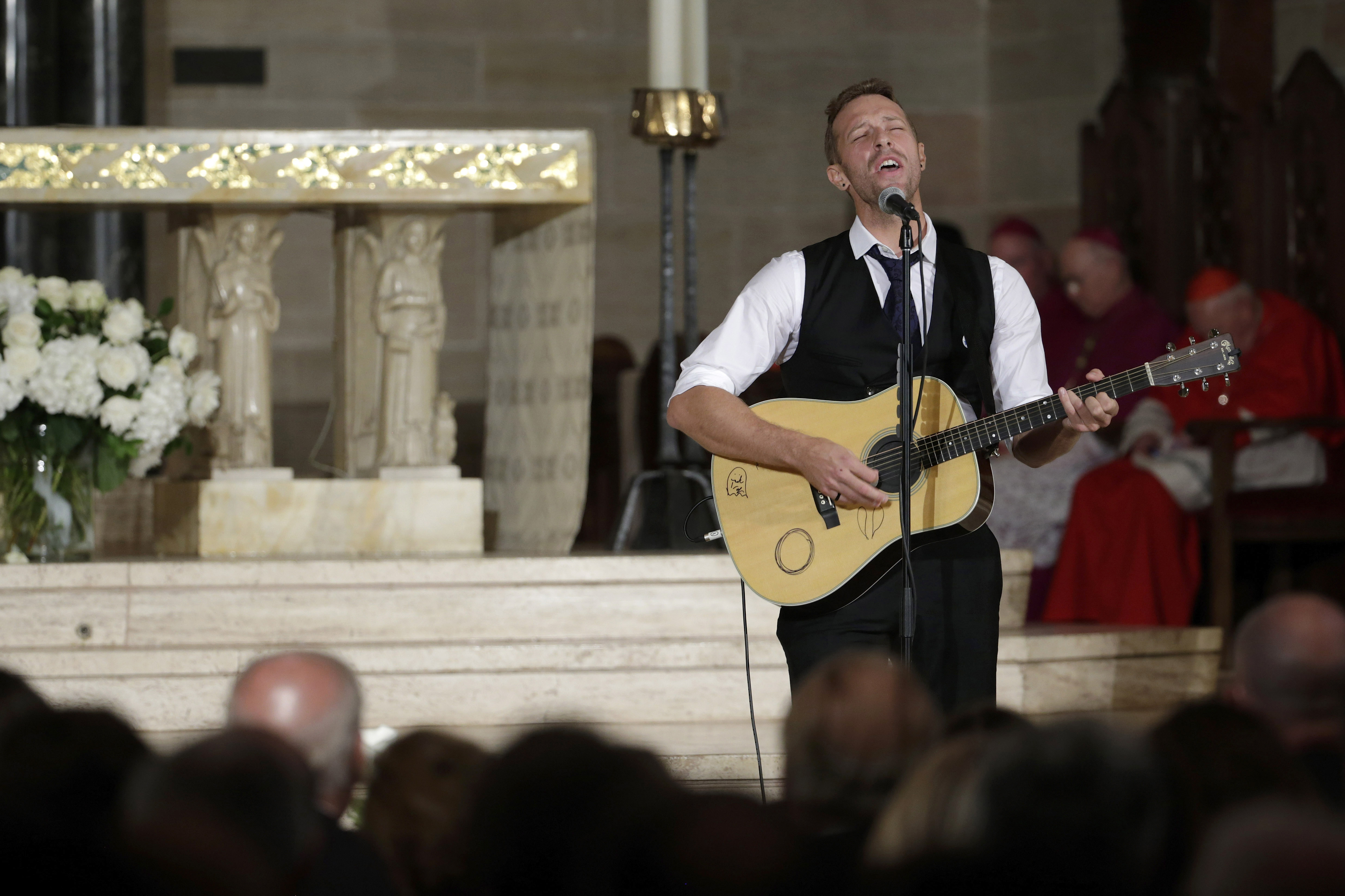 Chris Martin beau biden funeral