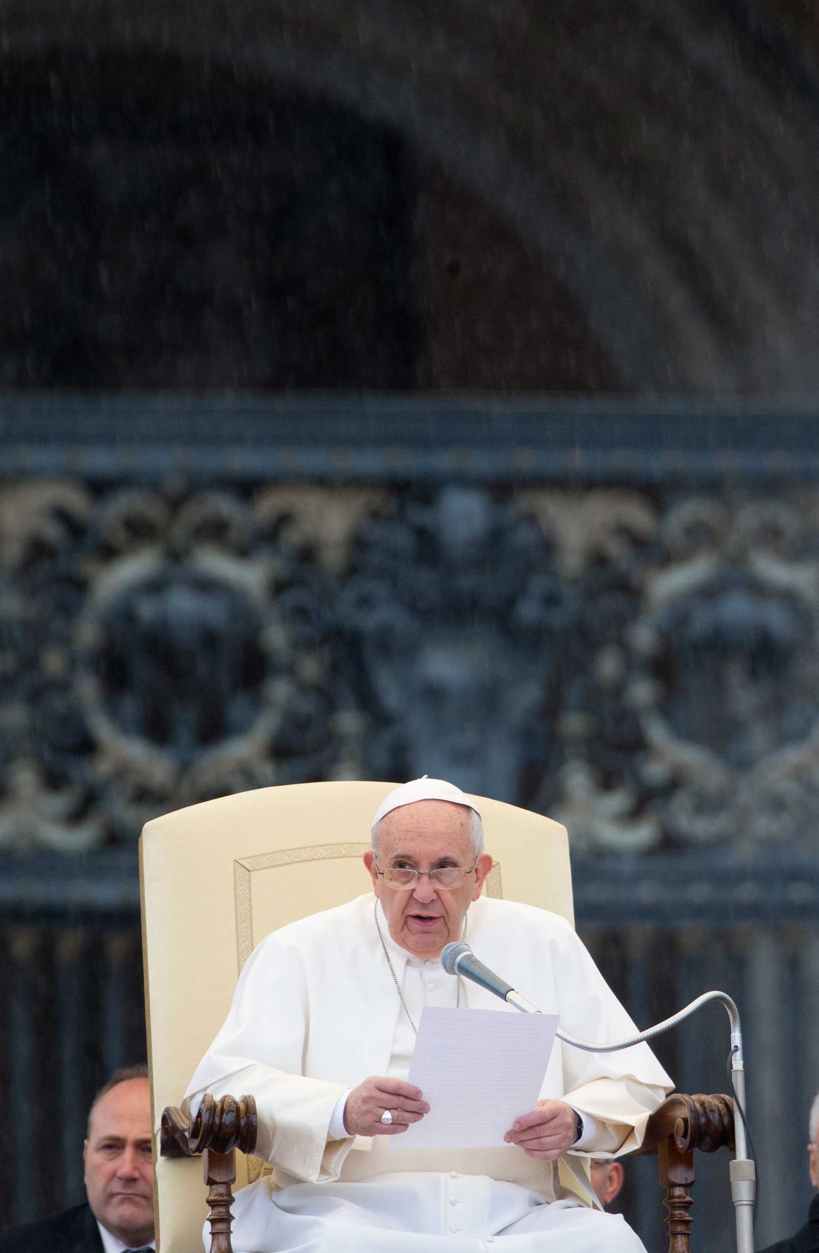 Pope Francis speaks during his weekly general audience in St. Peter's Square at the Vatican, March 25, 2015.