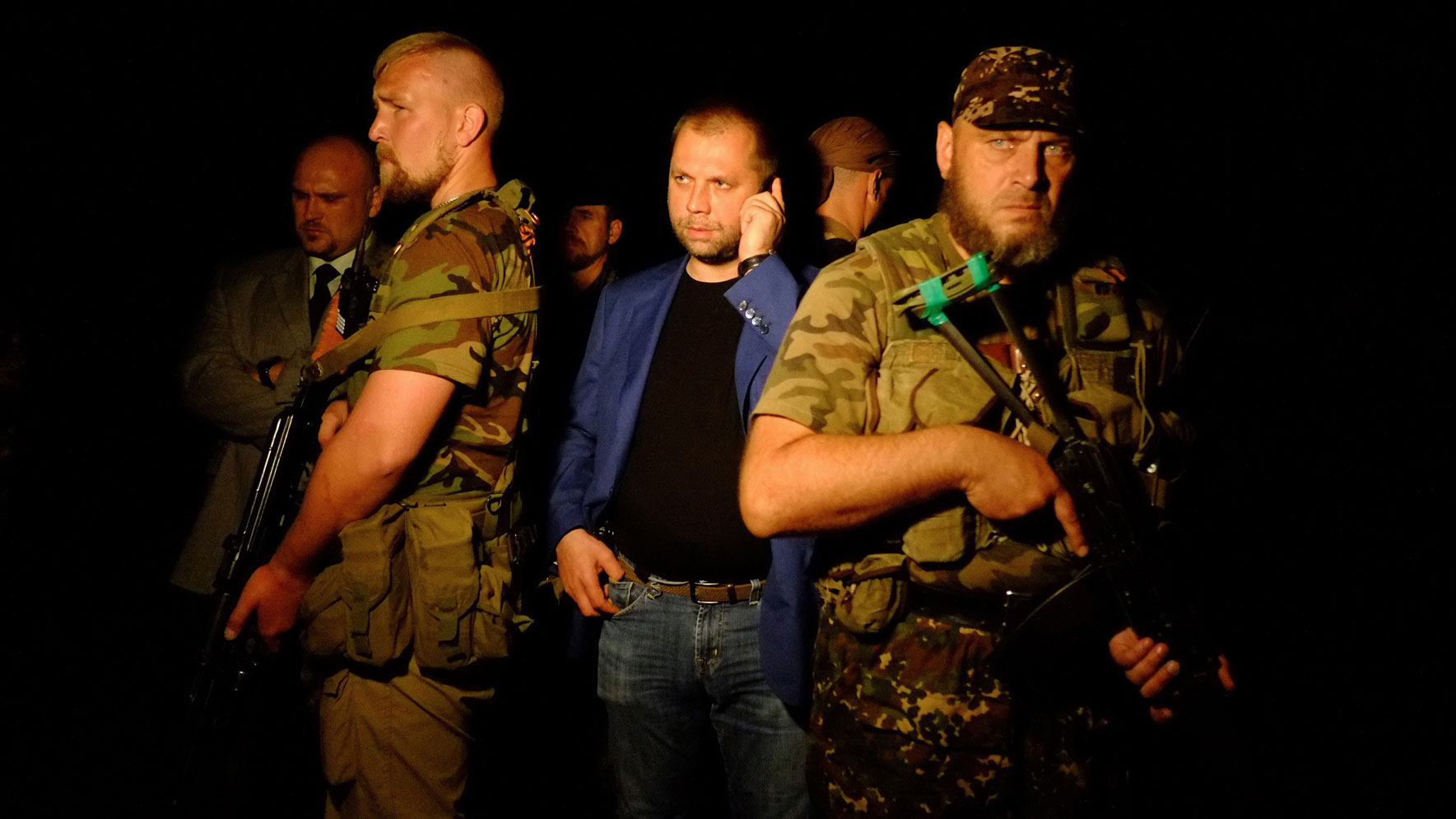 Self-proclaimed Prime Minister of the pro-Russian separatist "Donetsk People's Republic" Alexander Borodai stands as he arrives on the site of the crash of a malaysian airliner carrying 298 people from Amsterdam to Kuala Lumpur, near the town of Shaktars