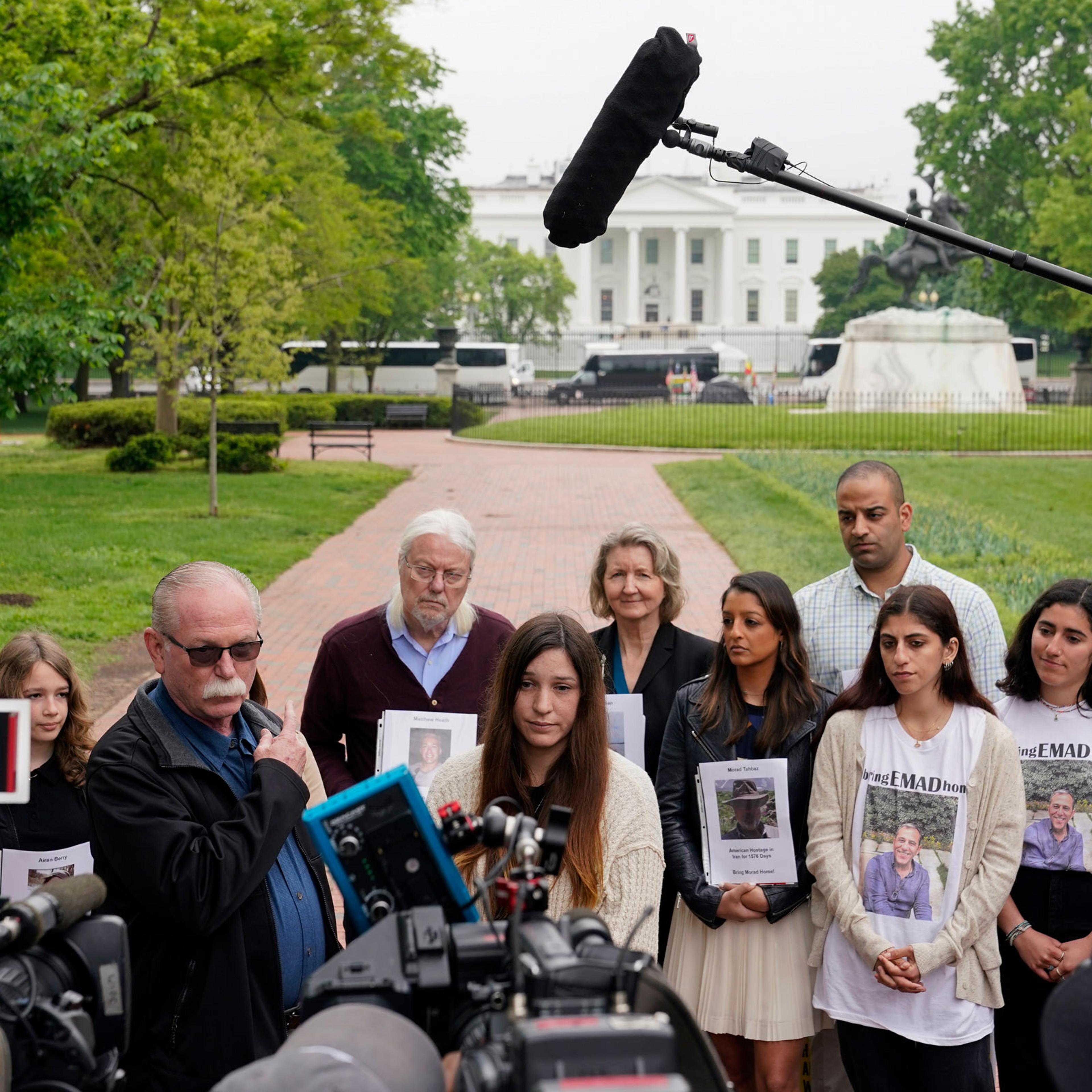 Joey Reed speaks alongside his daughter Taylor Reed, center, and families of Americans currently being held hostage or wrongfully detained overseas