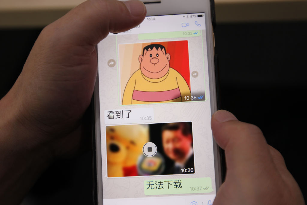 A photo taken of the screen of a smart phone using whatsapp shows a clear image of Japanese cartoon character Takeshi Goda and murky image of Xi Jinping and Winnie the Pooh in Beijing on Jul. 19, 2017. 19JUL17 SCMP/Simon Song