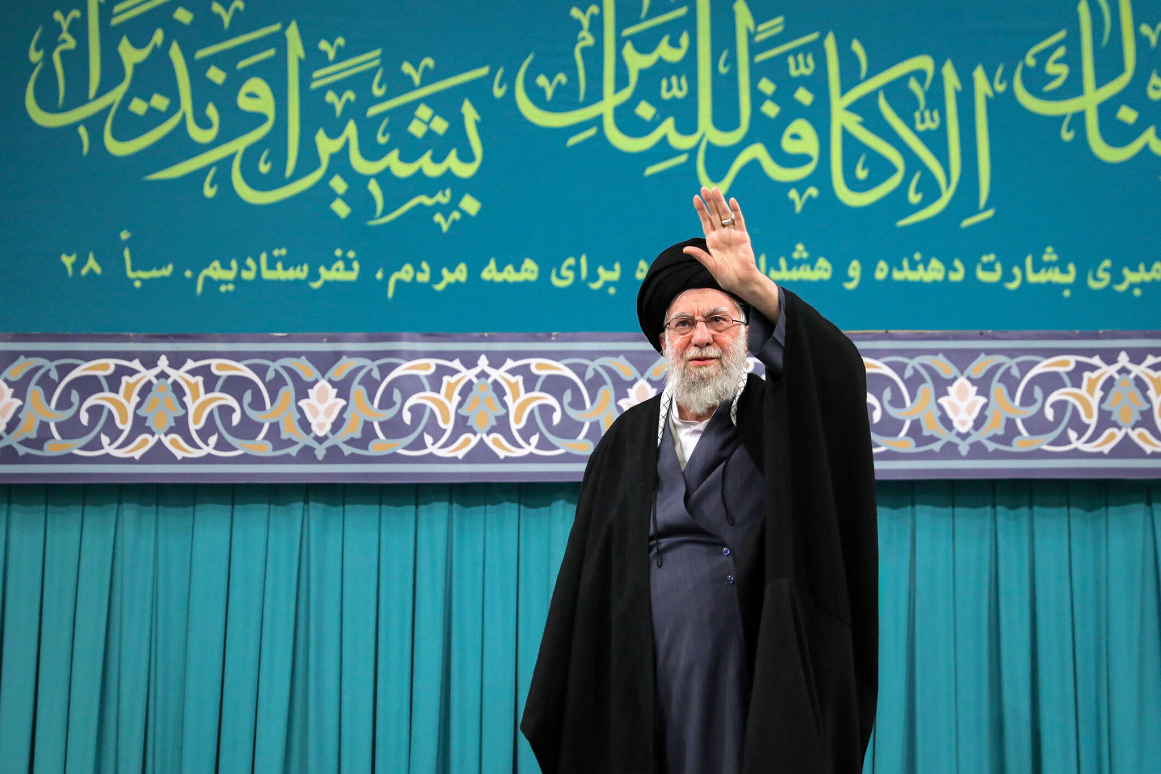 Iran's Supreme Leader Ali Khamenei greets the crowd as he attends a program held in Tehran on Jan. 17, 2026.