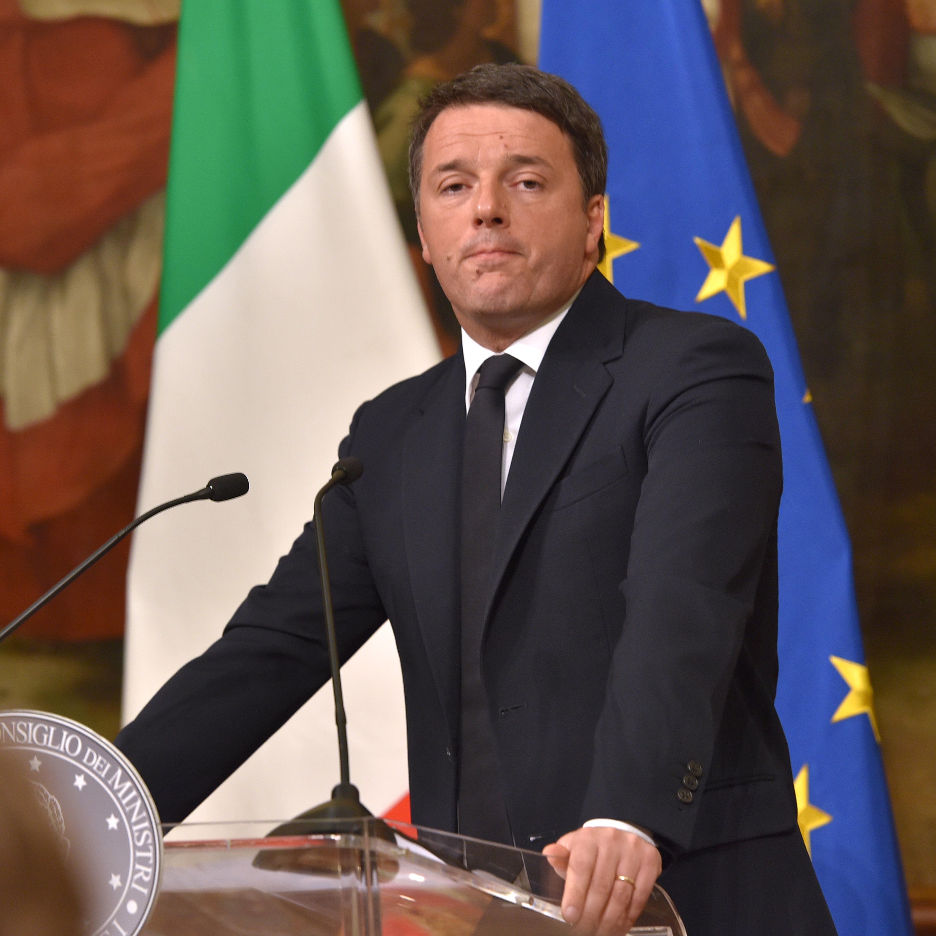Italy's Prime Minister Matteo Renzi announces his resignation during a press conference at the Palazzo Chigi following the results of the vote for a referendum on constitutional reforms, on December 5, 2016 in Rome.