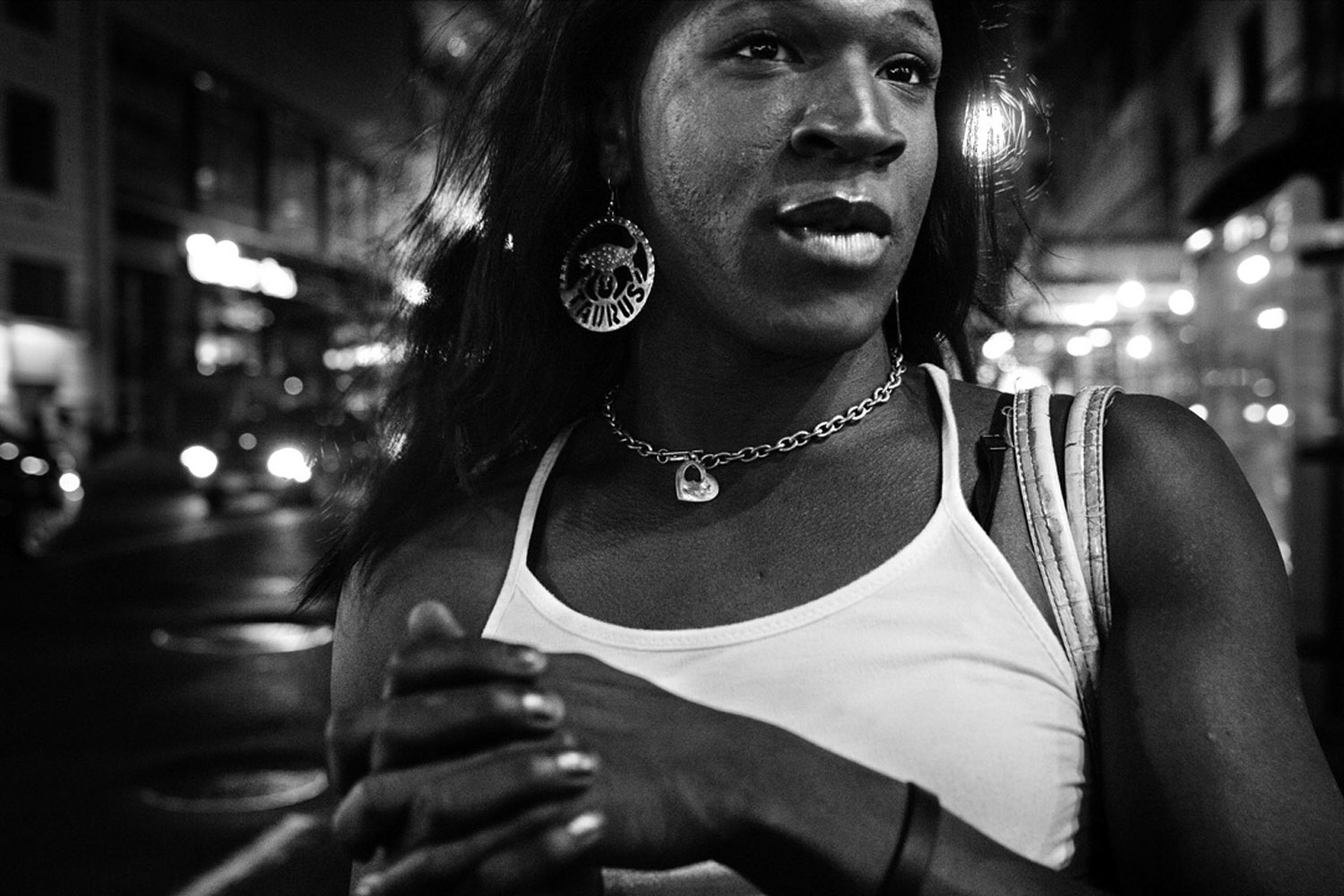 K. pauses on 34th Street while on her way to the Village. August 2006.<br /><br />
Transgender people comprise the highest proportion of homeless LGBT youth. In particular, they are often denied access to shelter services, particularly in shelters that segregate clients based on birth sex. Discrimination and lack of identification that reflects their chosen name and gender makes it hard for many young transwomen to find a legal job, leaving sex work as one of the few options available to them.  