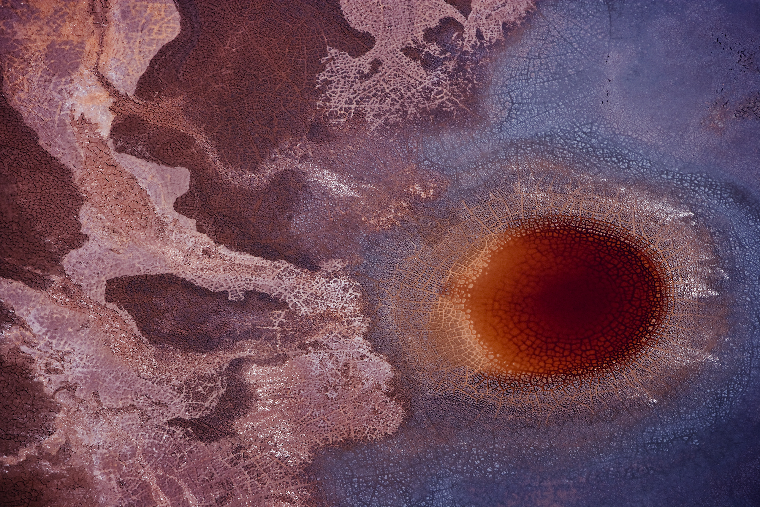 Gramercy, LouisianaRed mud waste material from an aluminium refinery is pumped onto the upper surface of a massive waste impoundment in a water slurry. The impoundments are essentially very large shallow bowls, engineered to de-water the slurry through e