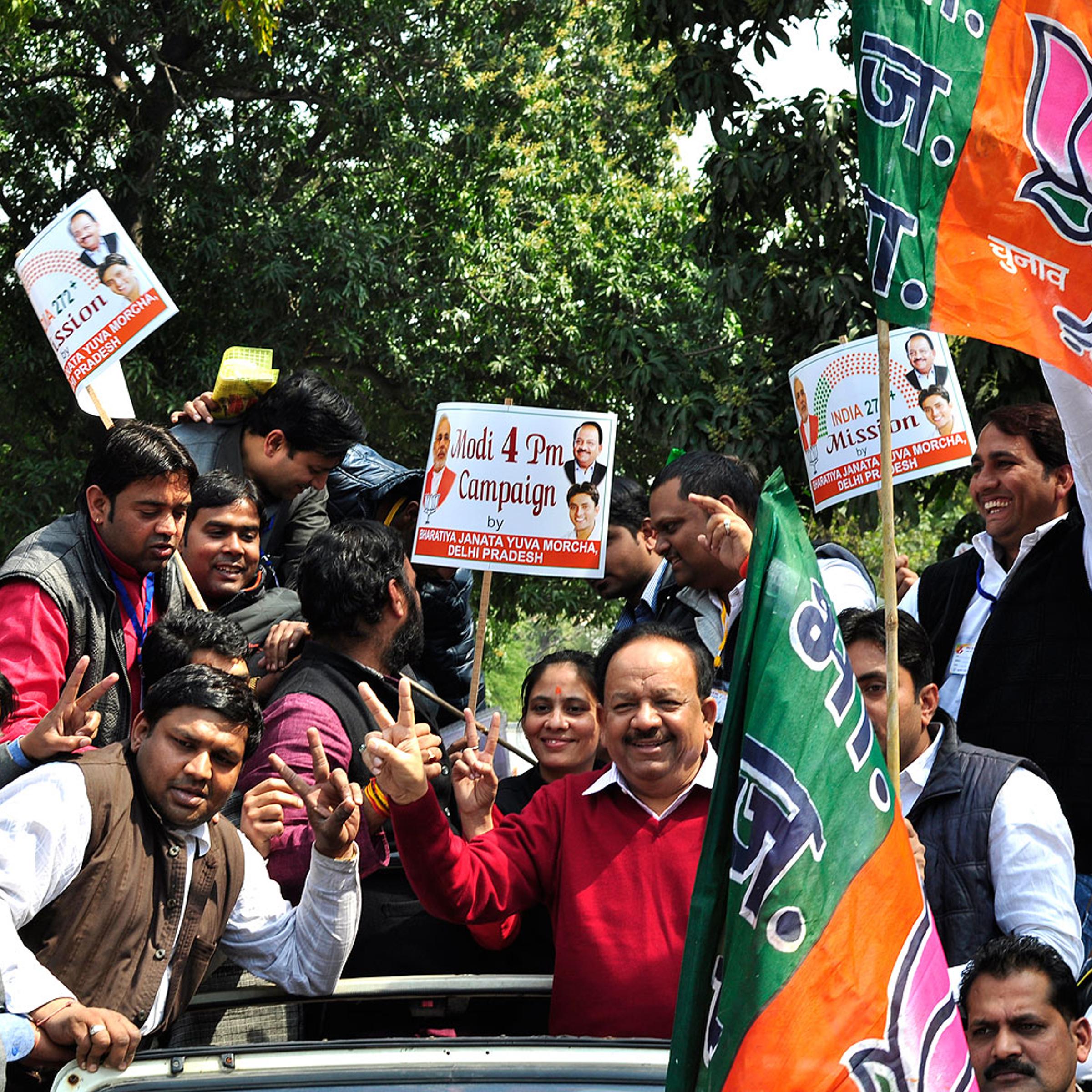 BJP Delhi president Harsh Vardhan launches a rally promoting Narendra Modi as the prime-ministerial candidate at the forthcoming Lok Sabha elections at the BJP office in New Delhi on March 4, 2014