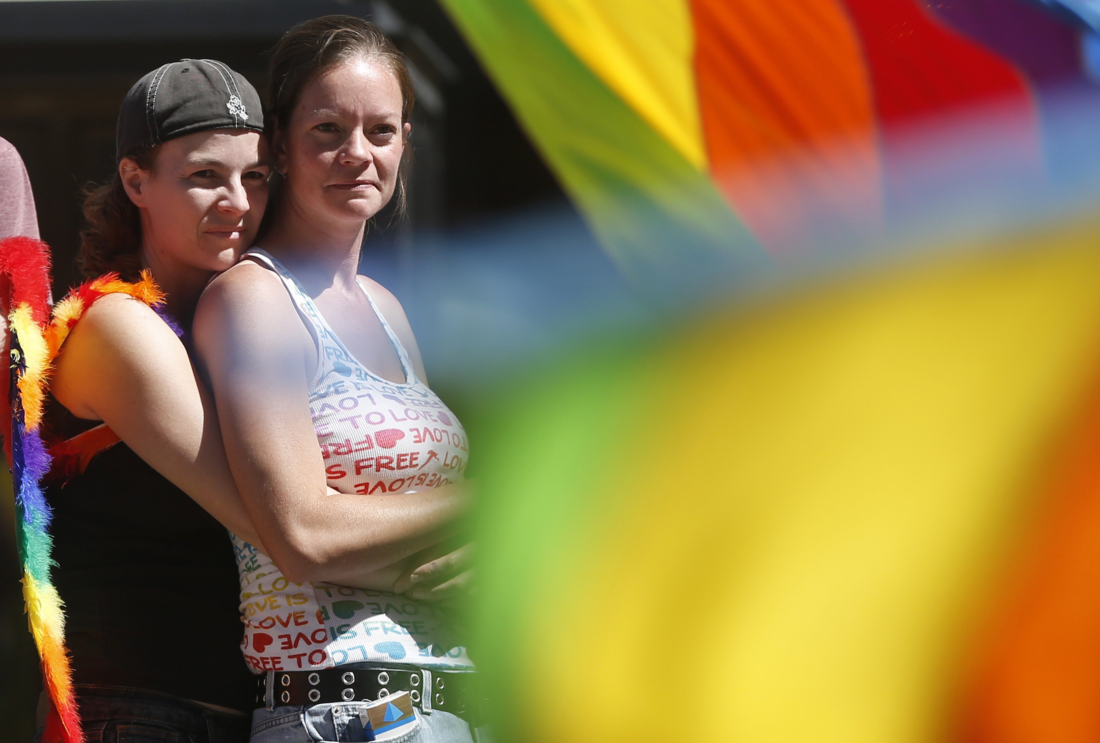 Herre and her partner Mark watch the Utah Pride Parade in Salt Lake City