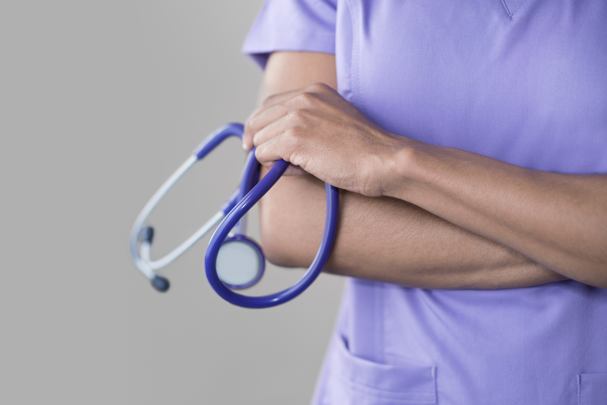 Female doctor holding stethoscope