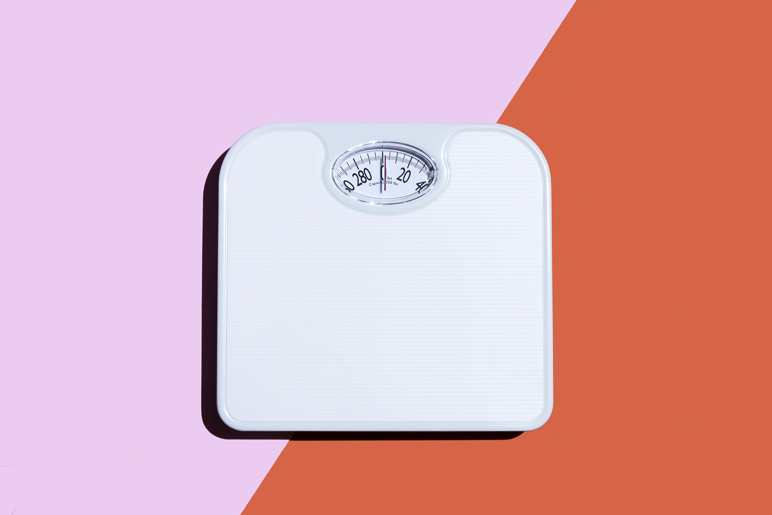 scale-weight-body-image-diet-health-fitness-advice-betterment-motto-stock