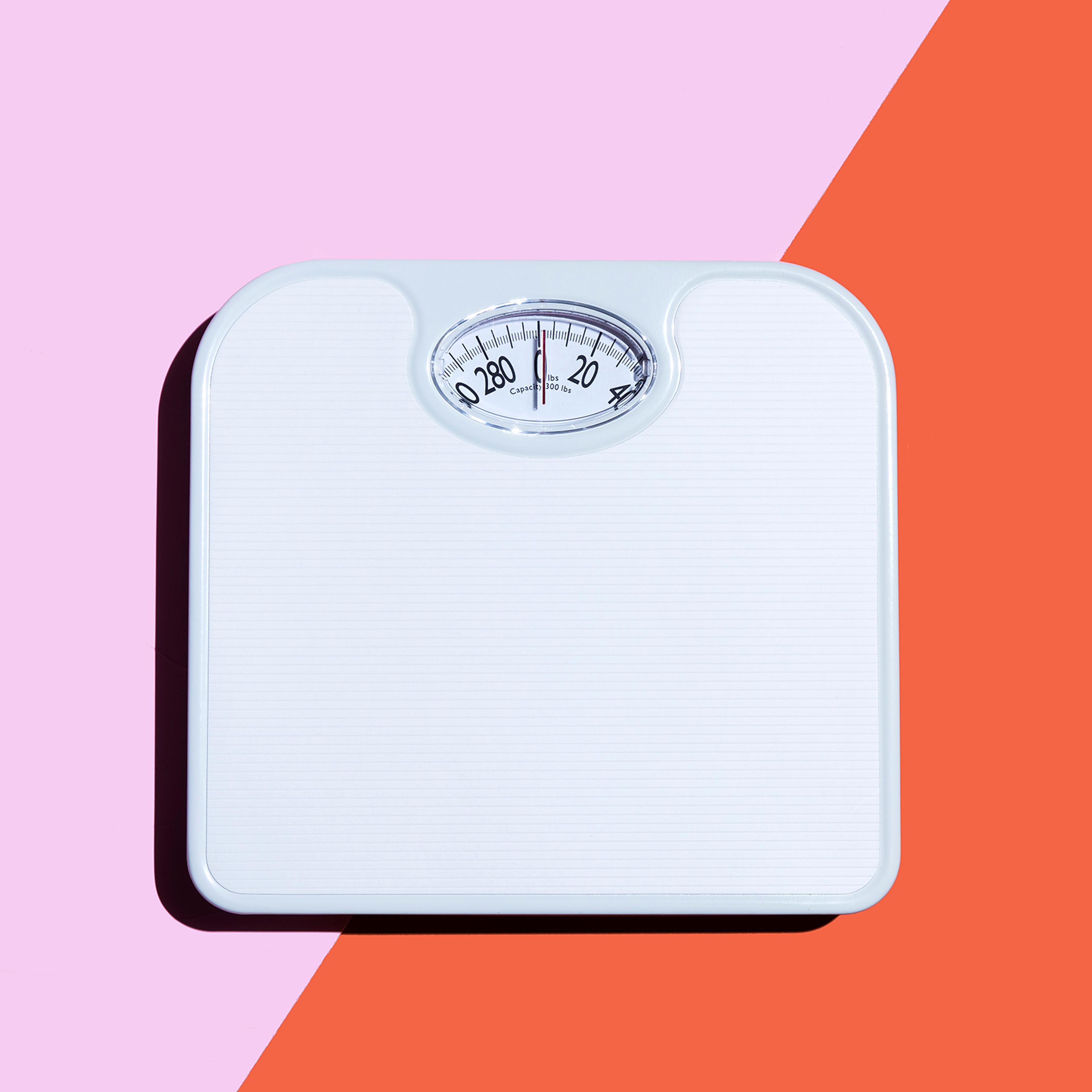 scale-weight-body-image-diet-health-fitness-advice-betterment-motto-stock