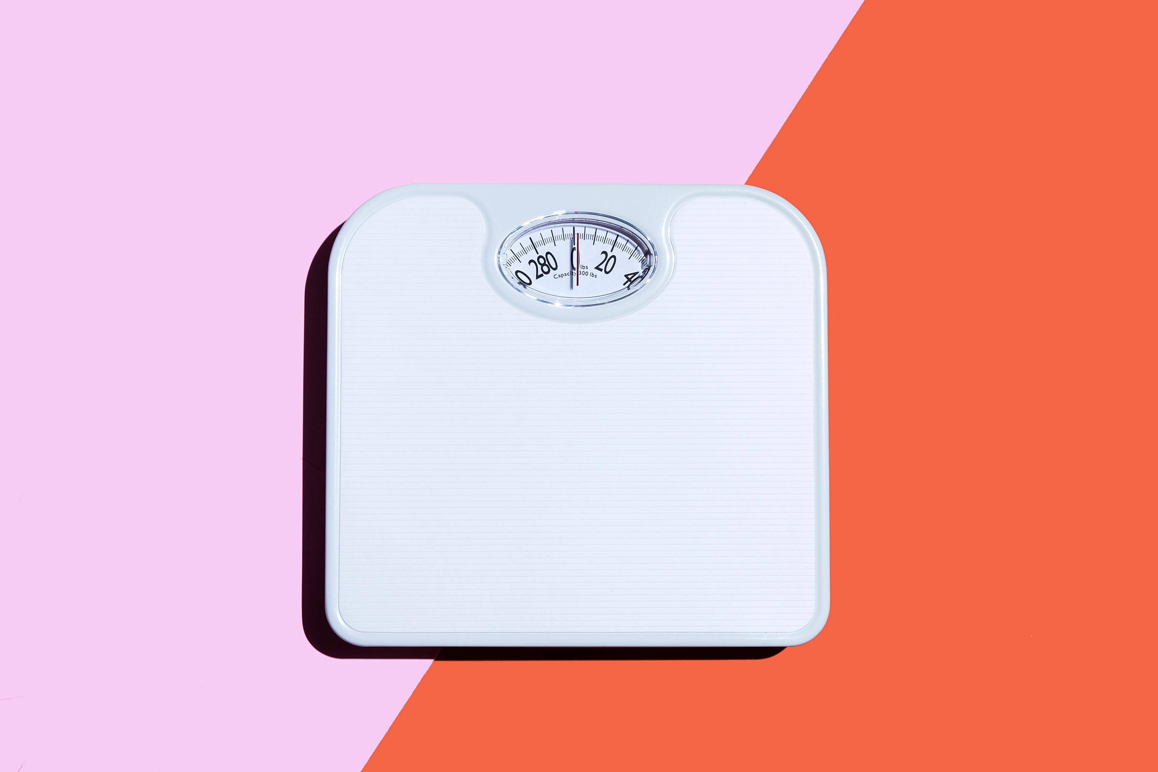 scale-weight-body-image-diet-health-fitness-advice-betterment-motto-stock