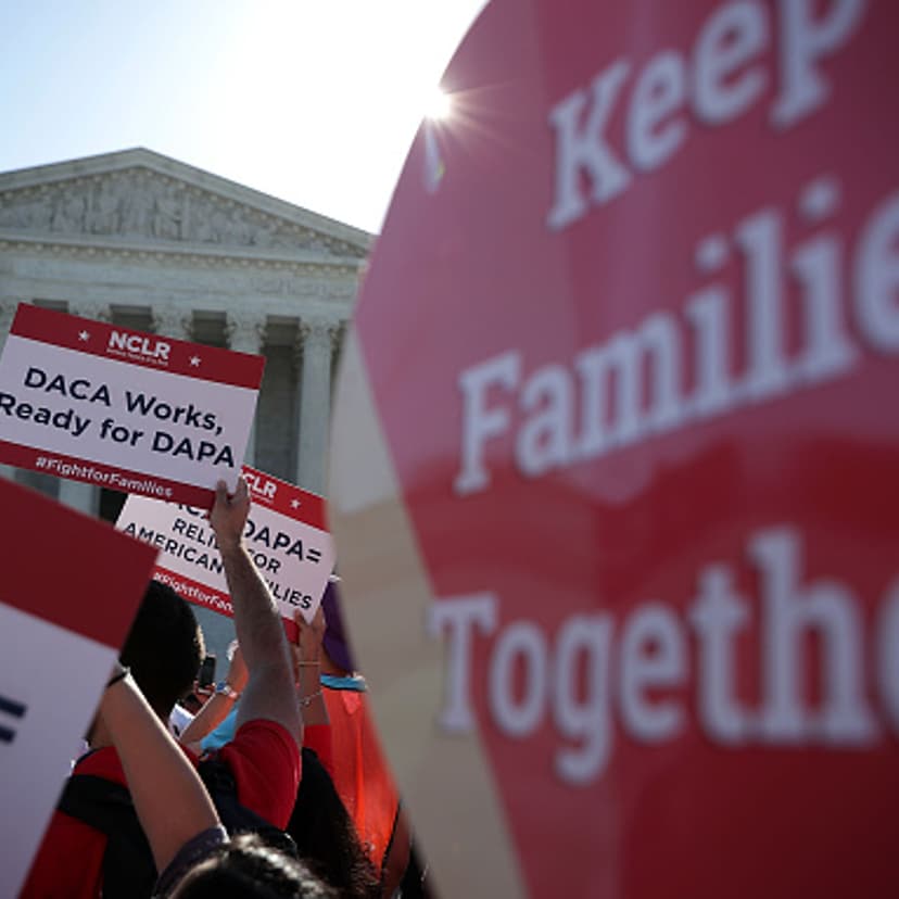 Pro-immigration activists gather in front of the U.S. Supreme Court on April 18, 2016 in Washington, DC.