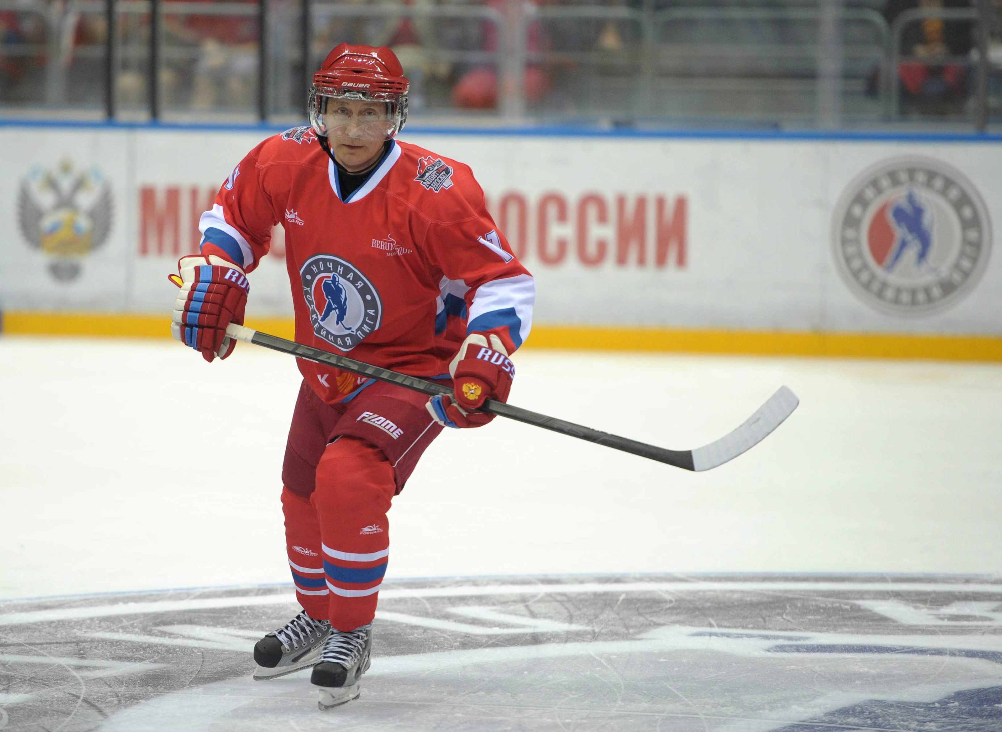 President Vladimir Putin participates in a gala ice hockey match between Russian amateur players and ice hockey stars during the Night Hockey league tournament in the Black Sea resort of Sochi, Krasnodar region, Russia, May 10, 2014.