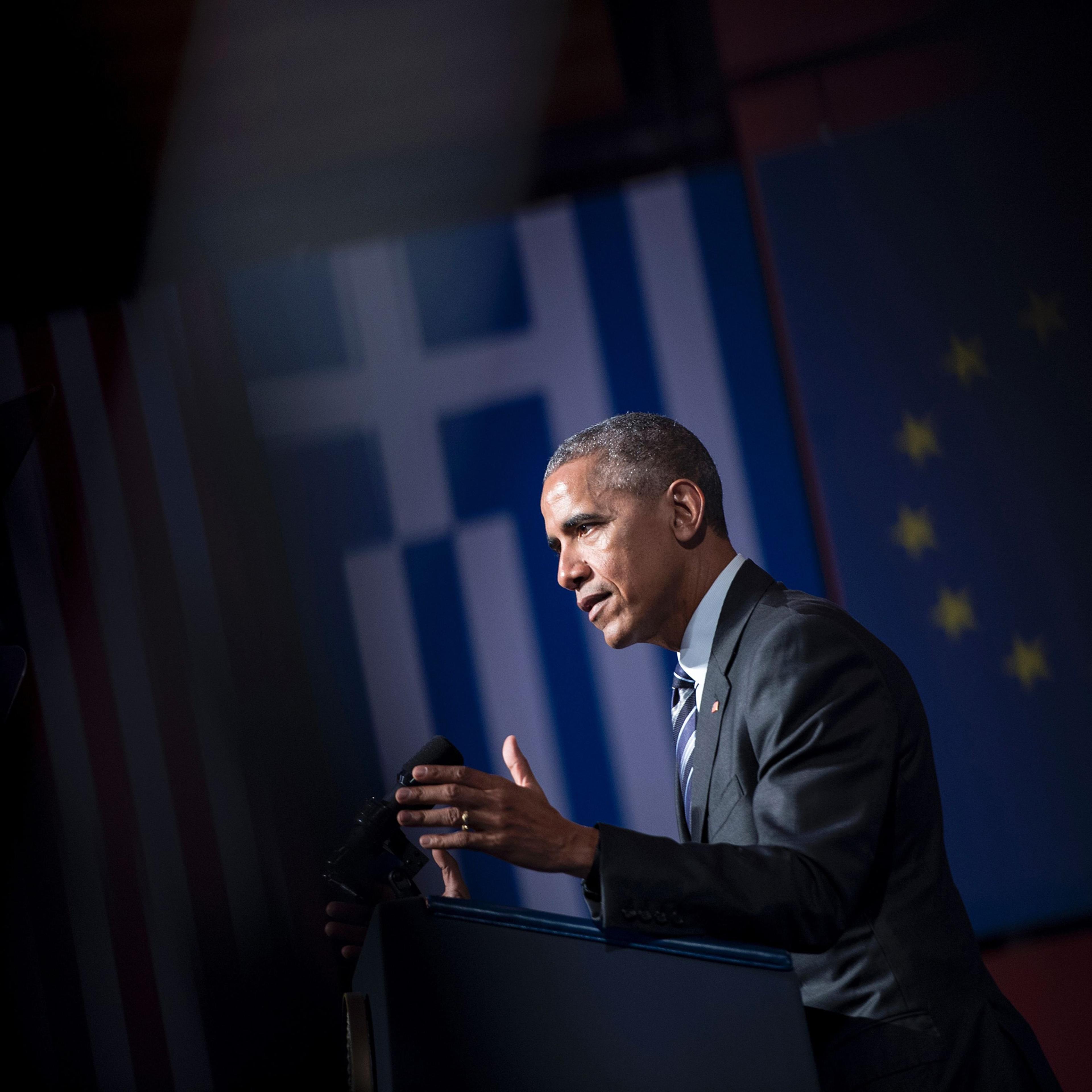 TOPSHOT - US President Barack Obama delivers a speech at the Stavros Niarchos Foundation Cultural Center on November 16, 2016 in Athens, Greece. Obama was on November 16 wrapping up the Greek leg of a farewell European trip with a visit to the Acropolis