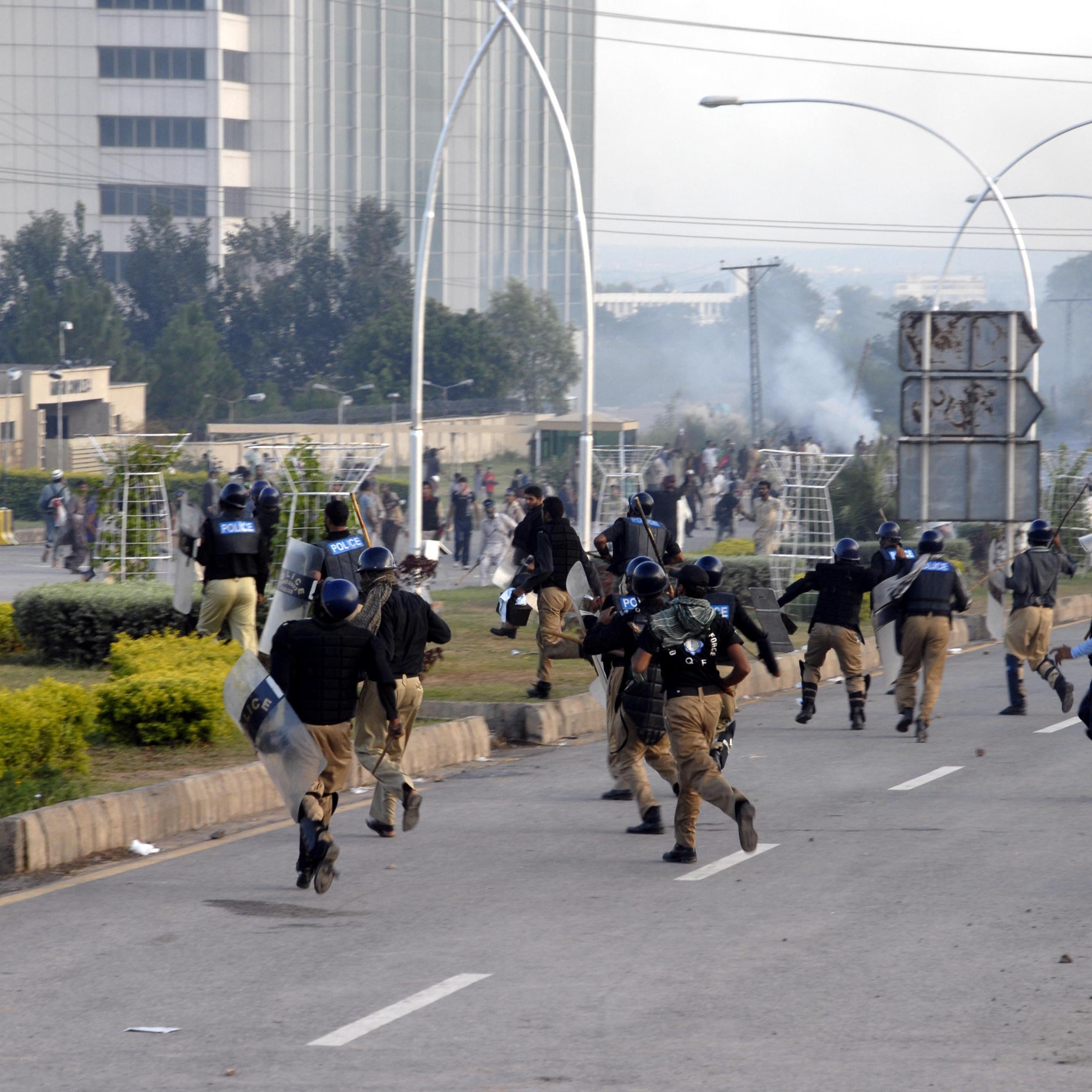 Supporters of Imran Khan and Tahir-ul-Qadri, attack