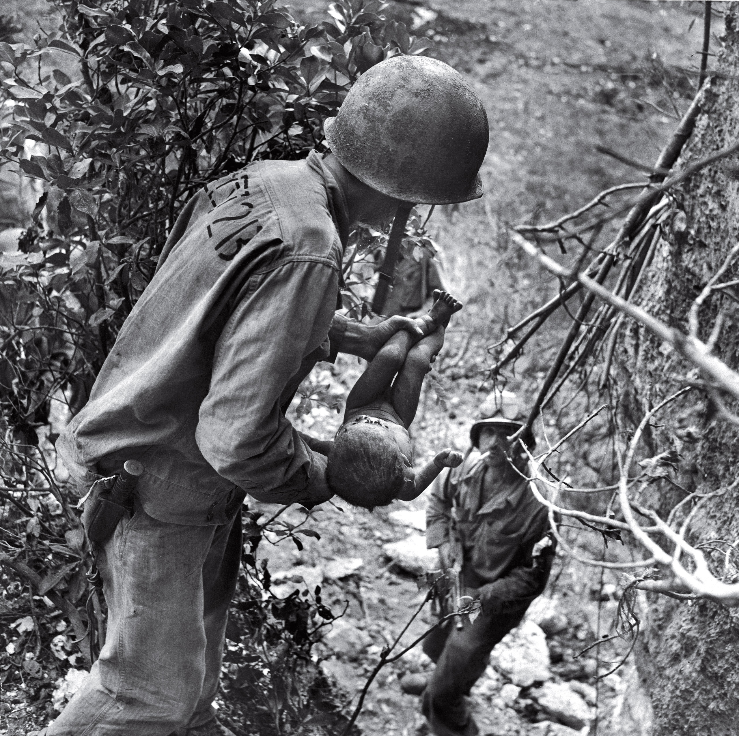 World War II Battle of Saipan photographed by W. Eugene Smith 1944.