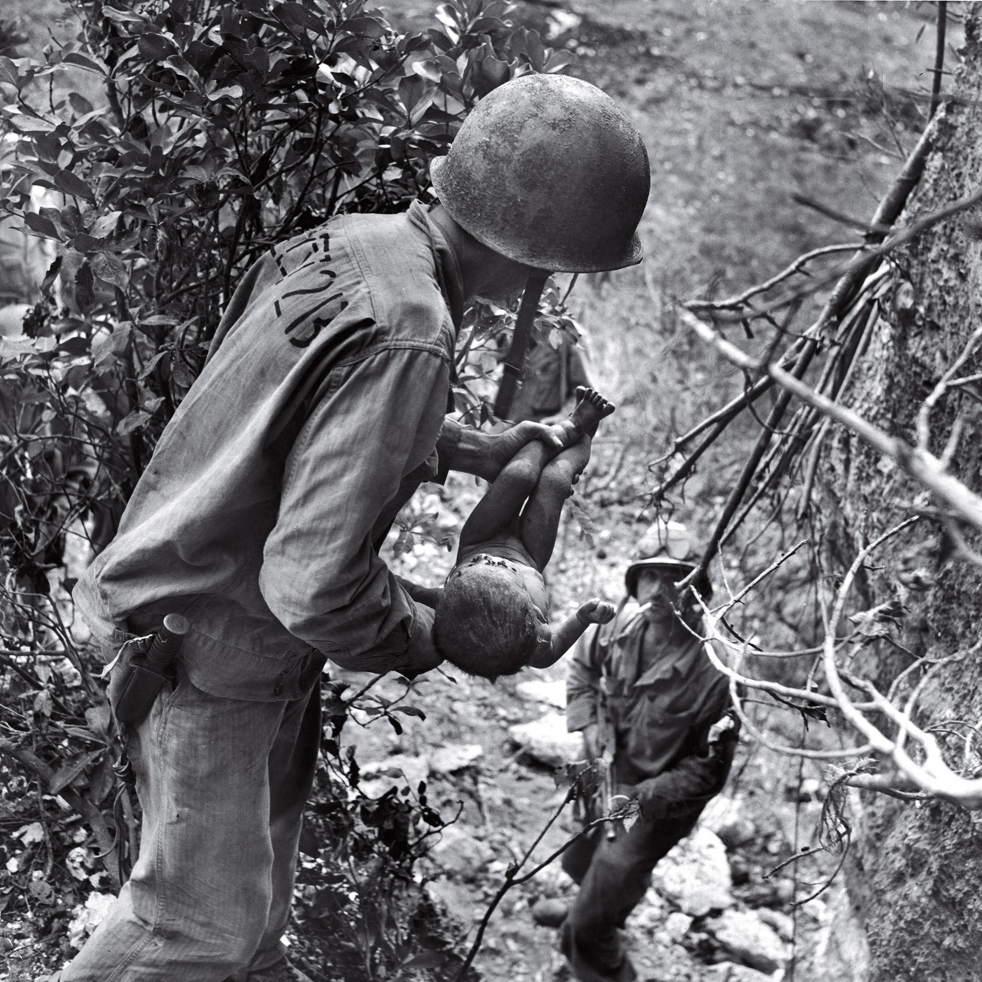 World War II Battle of Saipan photographed by W. Eugene Smith 1944.