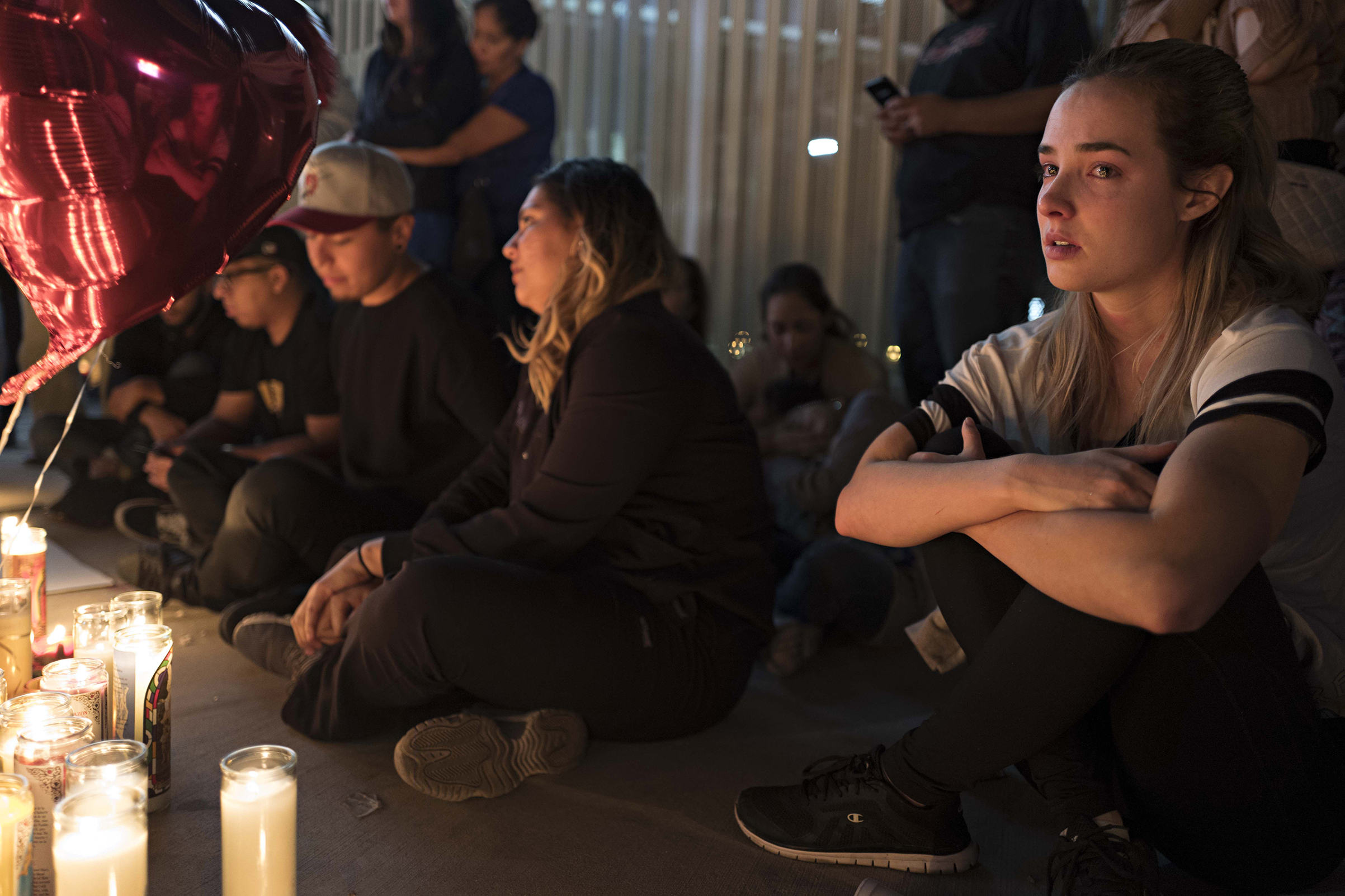 A street vigil held at Las Vegas Boulevard and Sahara Avenue, October 2, 2017.  photograph by Matt Stuart—Magnum for TIME