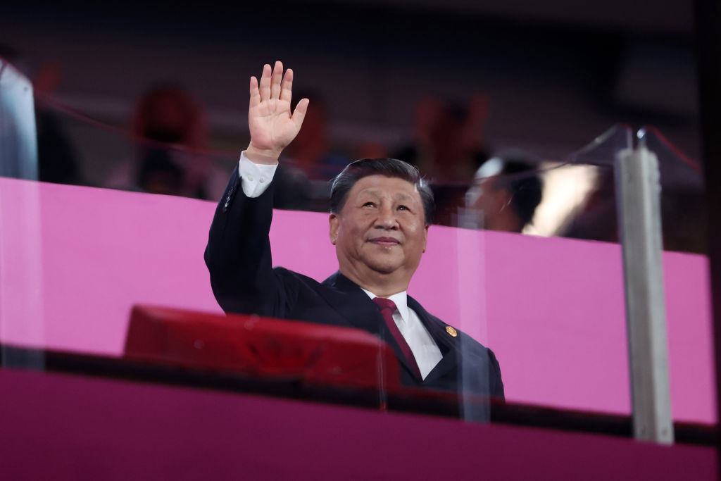 Chinese President Xi Jinping waves to the crowd during the opening ceremony of the 19th Asian Games at Hangzhou Sports Park Stadium on Sept. 23, 2023 in Hangzhou, China.