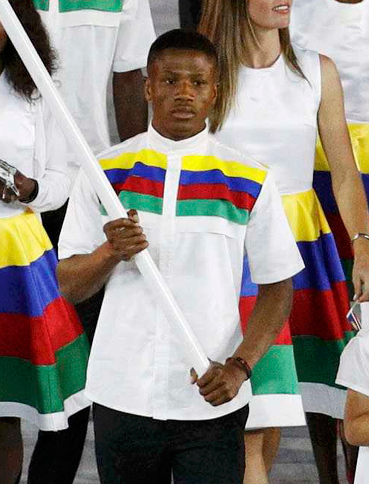 2016 Rio Olympics - Maracana - Rio de Janeiro, Brazil - 05/08/2016. Flagbearer Jonas Junius (NAM) of Namibia leads his contingent during the opening ceremony. Brazilian police have arrested Junius on suspicion of attempting to secually assault a room mai
