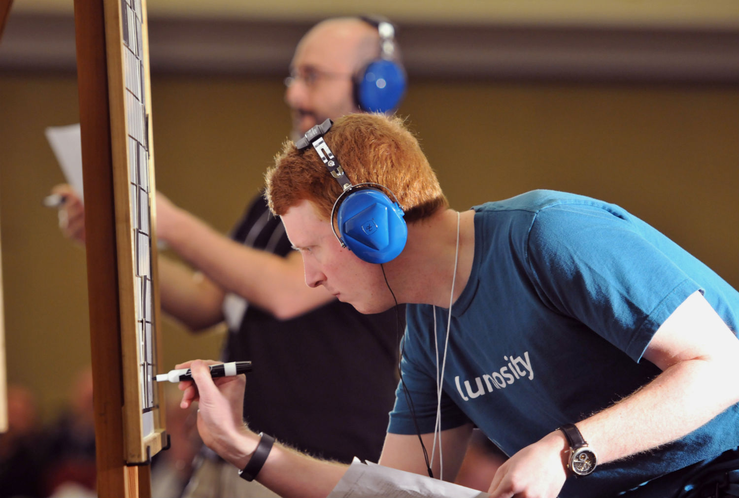 Tyler Hinman (foreground) battles rival Dan Feyer in the final of the American Crossword Puzzle Tournament in New York City on March 9, 2014. 