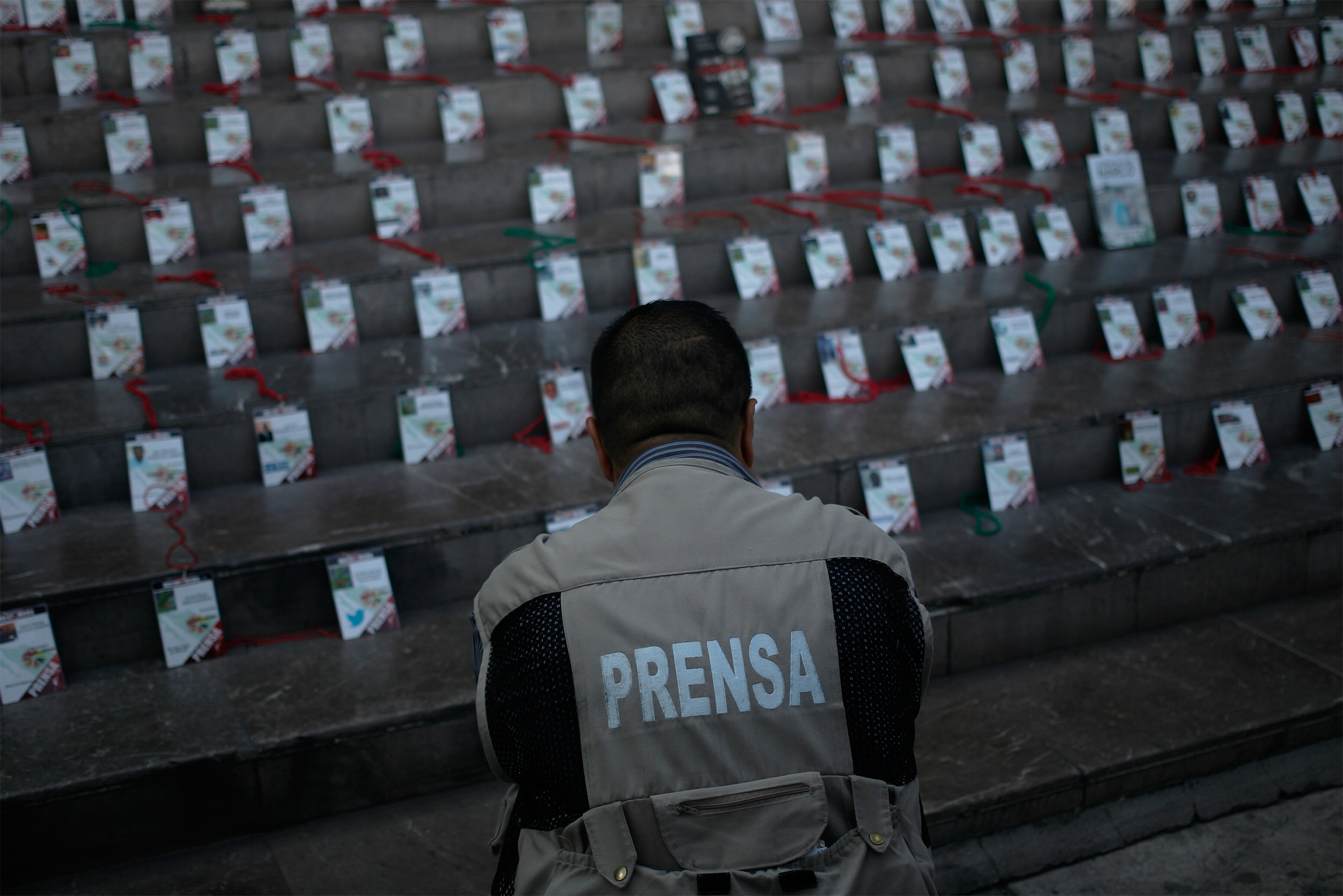 Journalists lay out the credentials of their murdered colleagues during a demonstration at the Attorney General's Office of Jalisco on May 16, 2017 in Guadalajara, Mexico following the murder of Javier Valdez Cardenas.