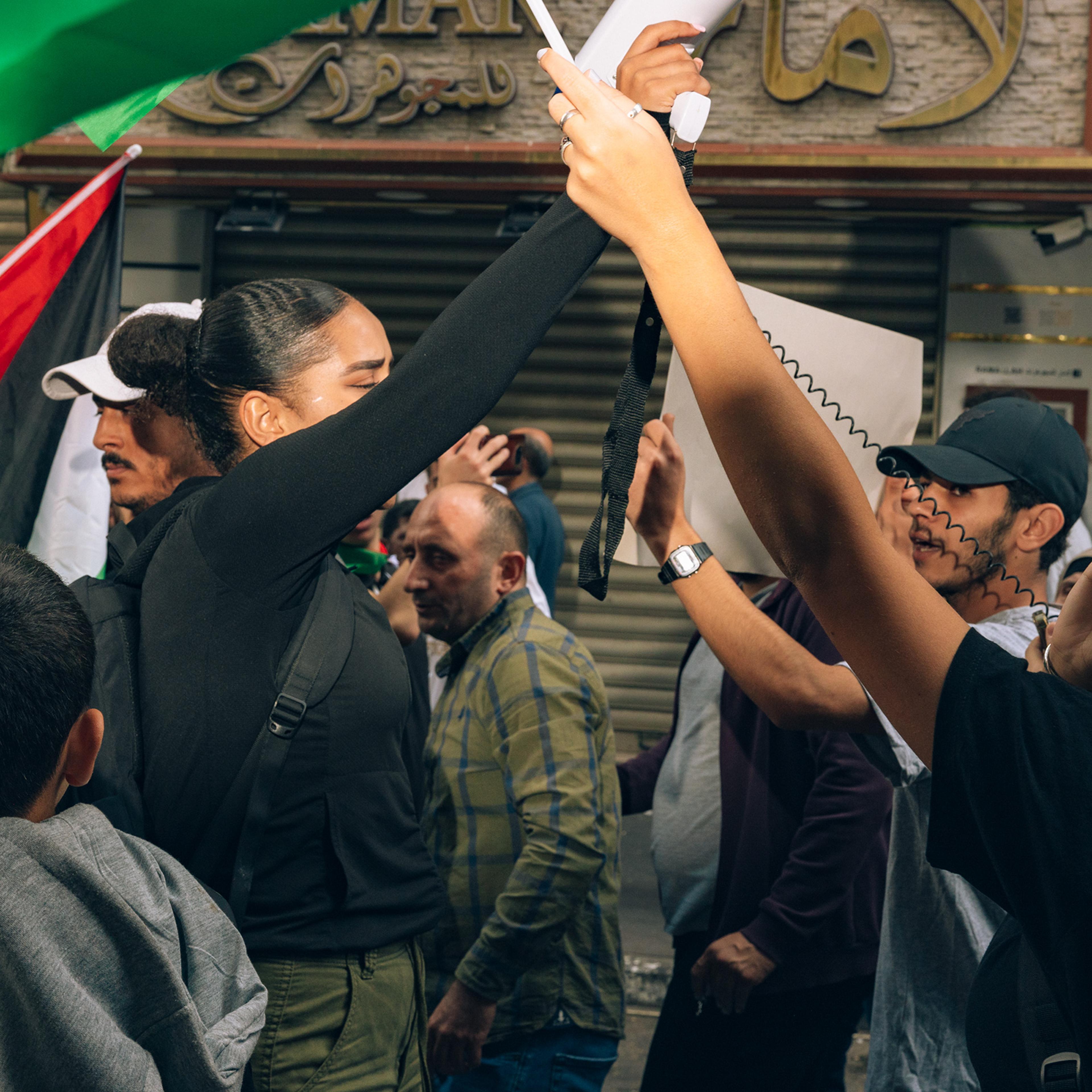 Hundreds of Palestinians march in a solidarity protest with Gaza in the West Bank city of Ramallah, on Oct. 20.