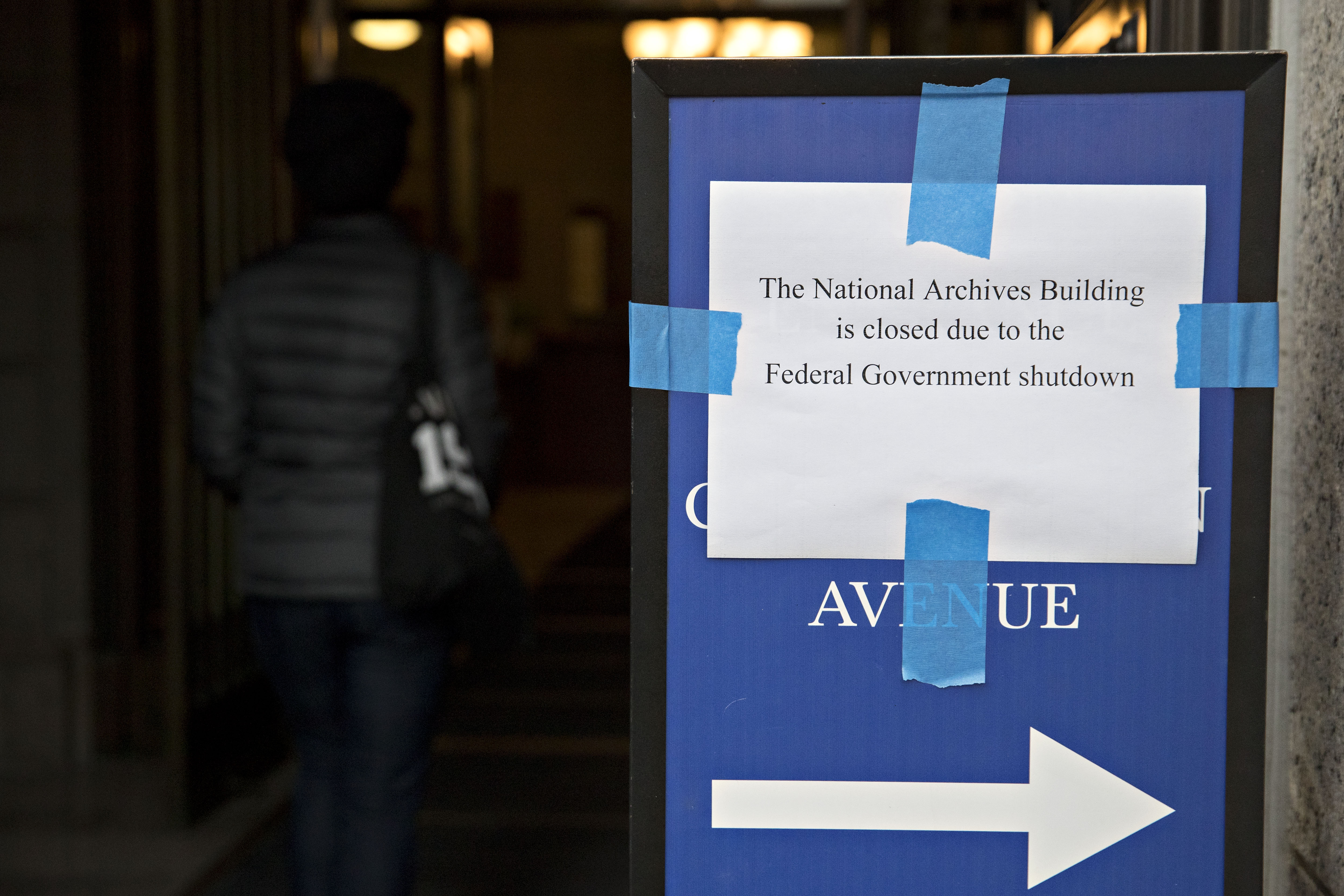 A sign indicating that the National Archives Building is closed due to the federal government shutdown stands outside the building in Washington, D.C., U.S., on Monday, Jan. 22, 2018.