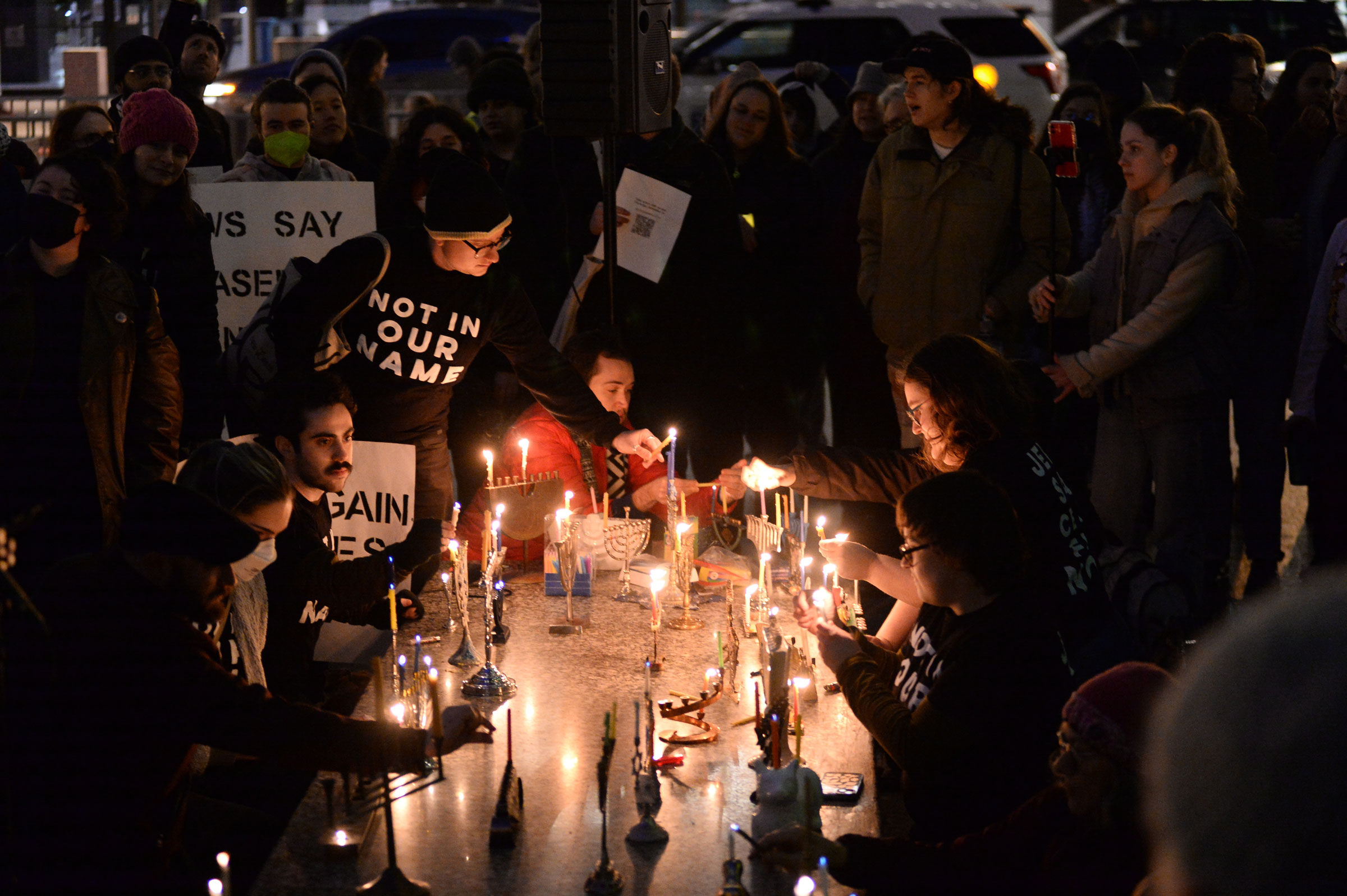 On the first night of Hannukah, people gathered at Federal Plaza in Chicago and lit candles to call for a ceasefire in Gaza