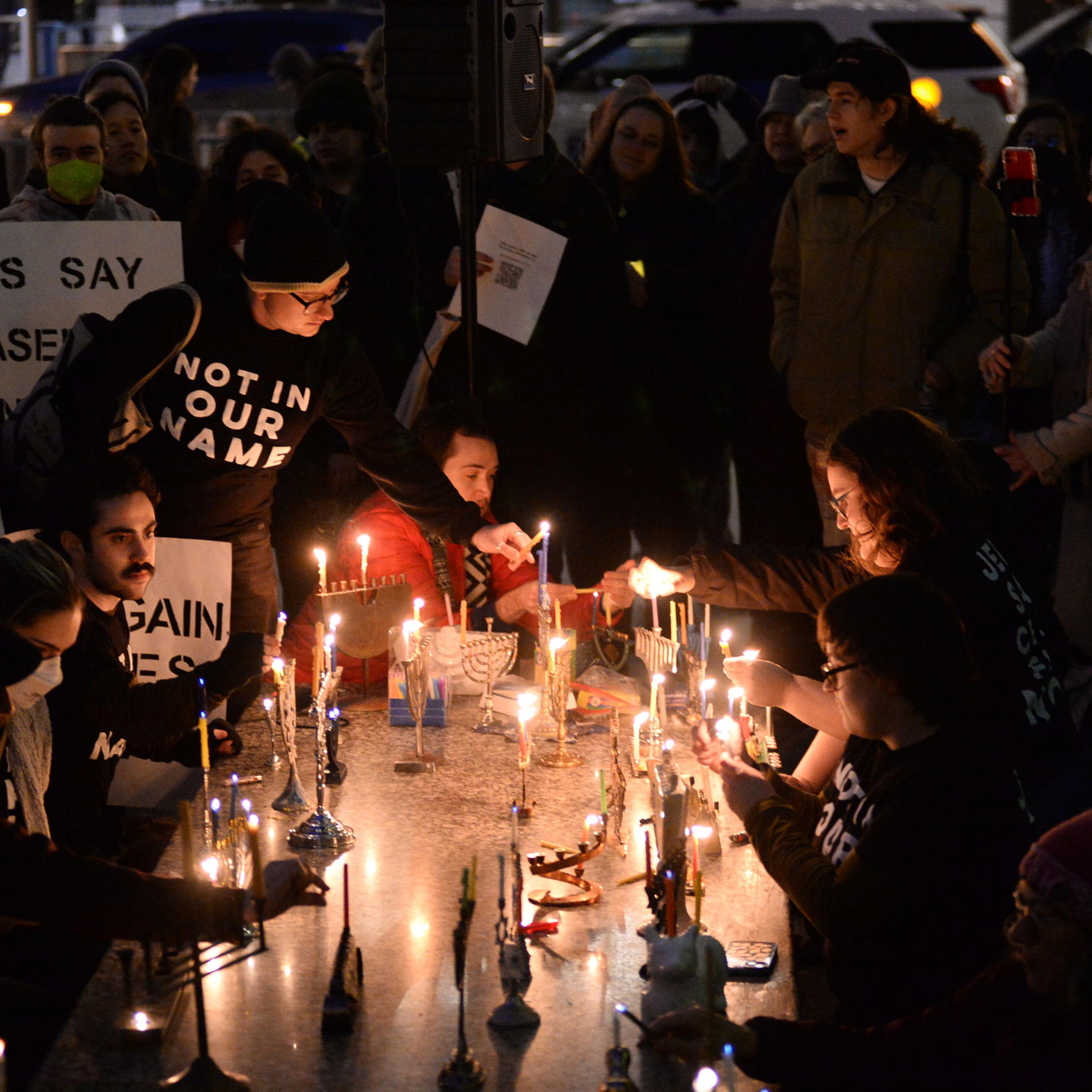 On the first night of Hannukah, people gathered at Federal Plaza in Chicago and lit candles to call for a ceasefire in Gaza