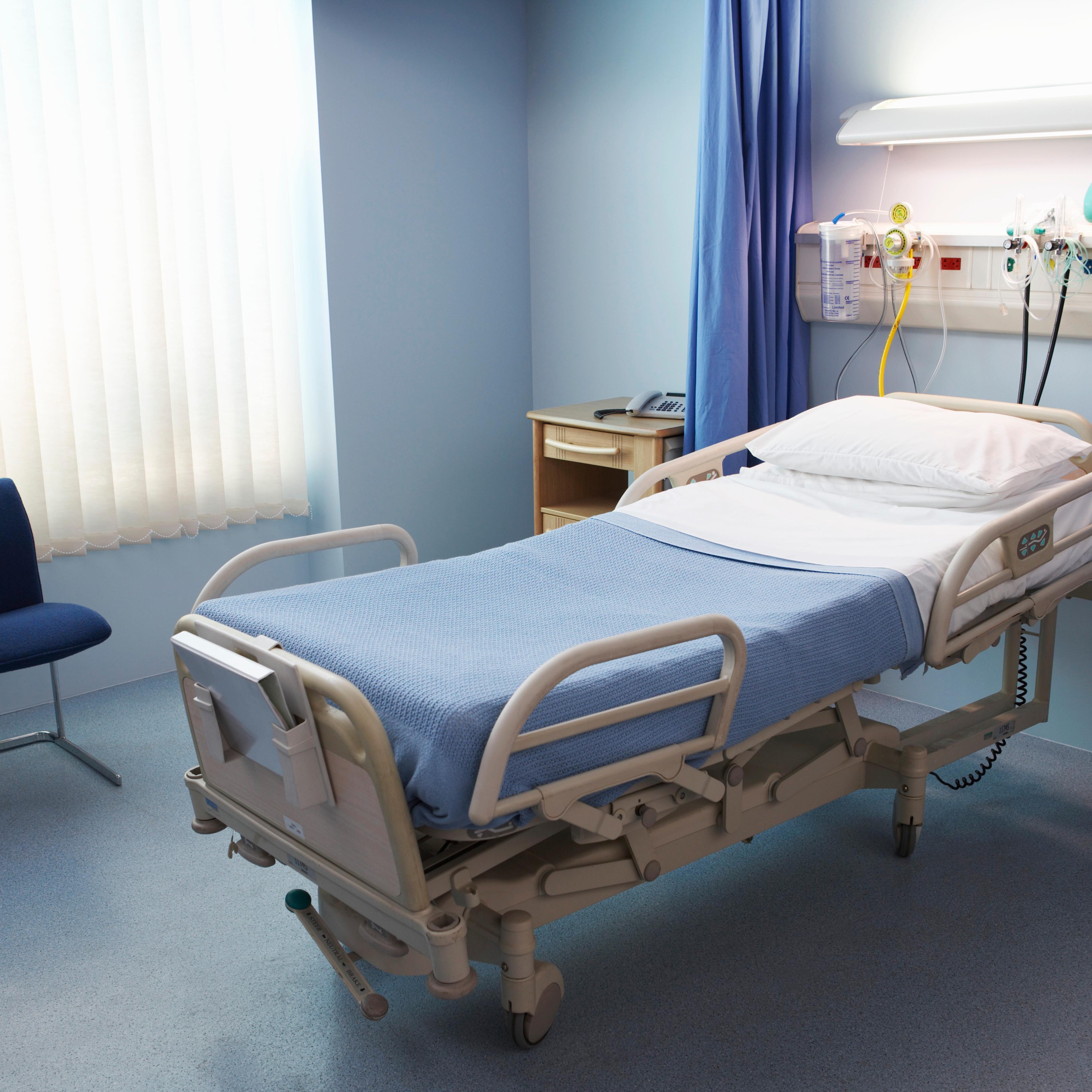 Empty Hospital Bed in a Ward