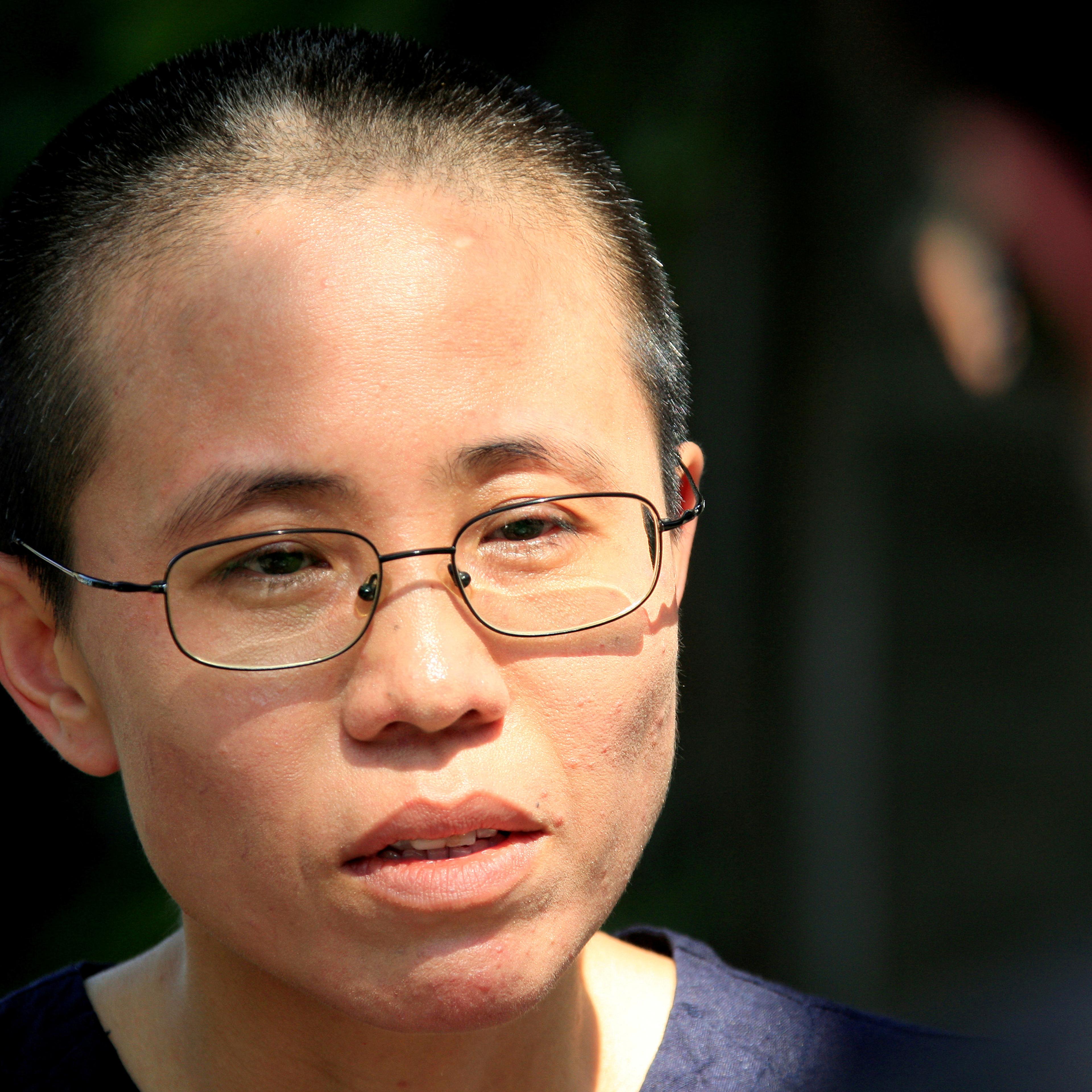 FILE PHOTO - Liu Xia, wife of veteran Chinese pro-democracy activist Liu Xiaobo, listens to a question during an interview in Beijing