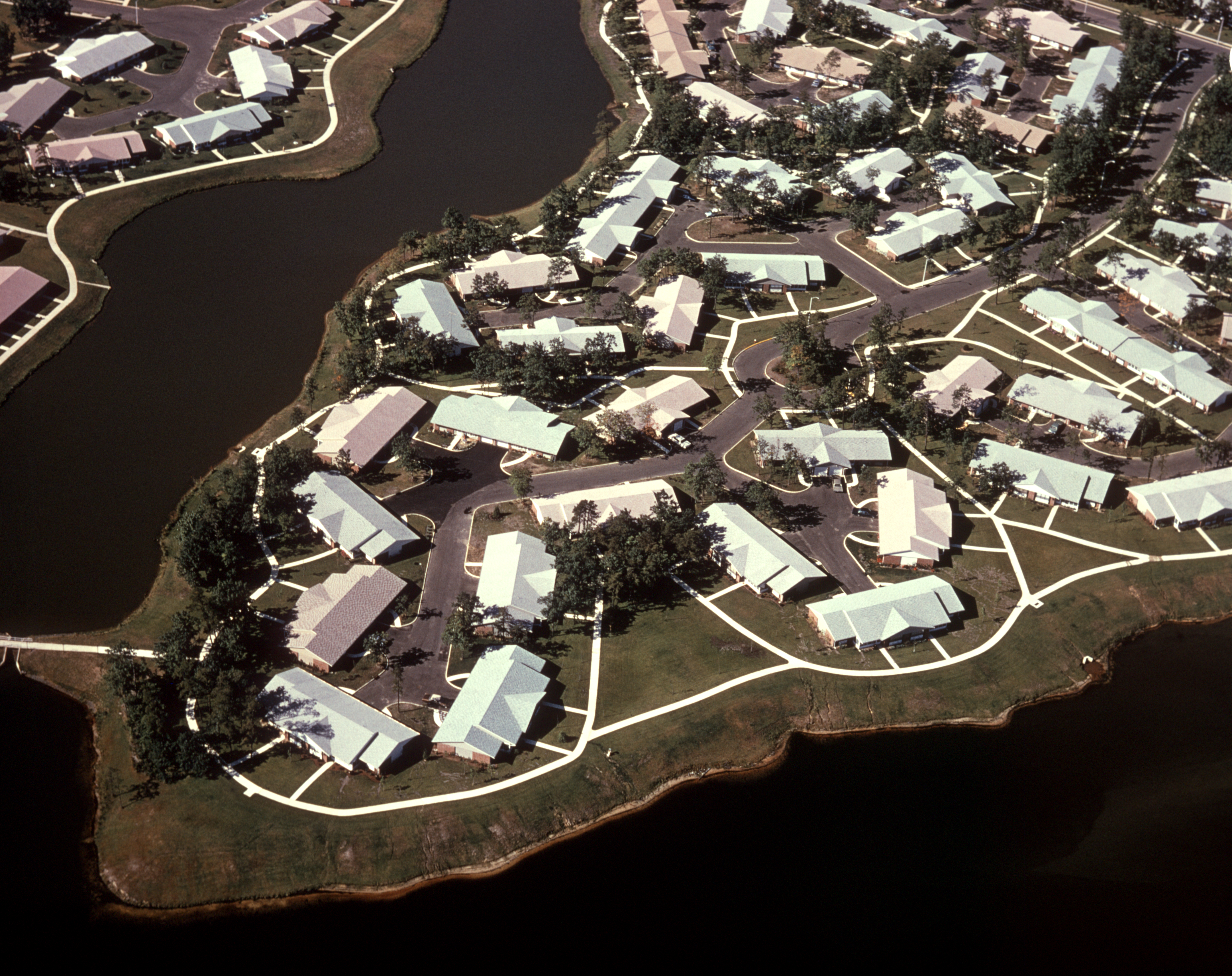 1970s AERIAL VIEW SUBURBAN...