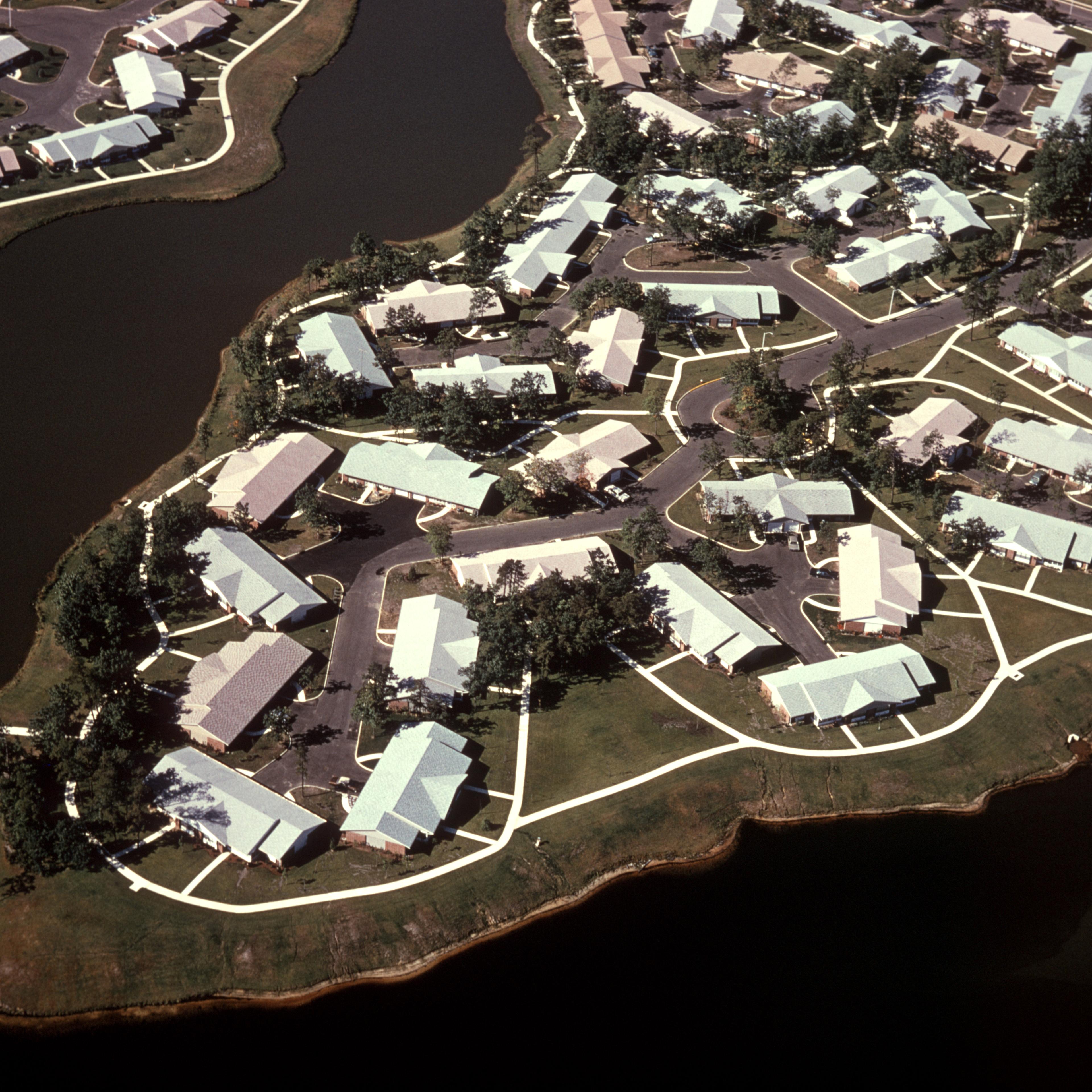 1970s AERIAL VIEW SUBURBAN...