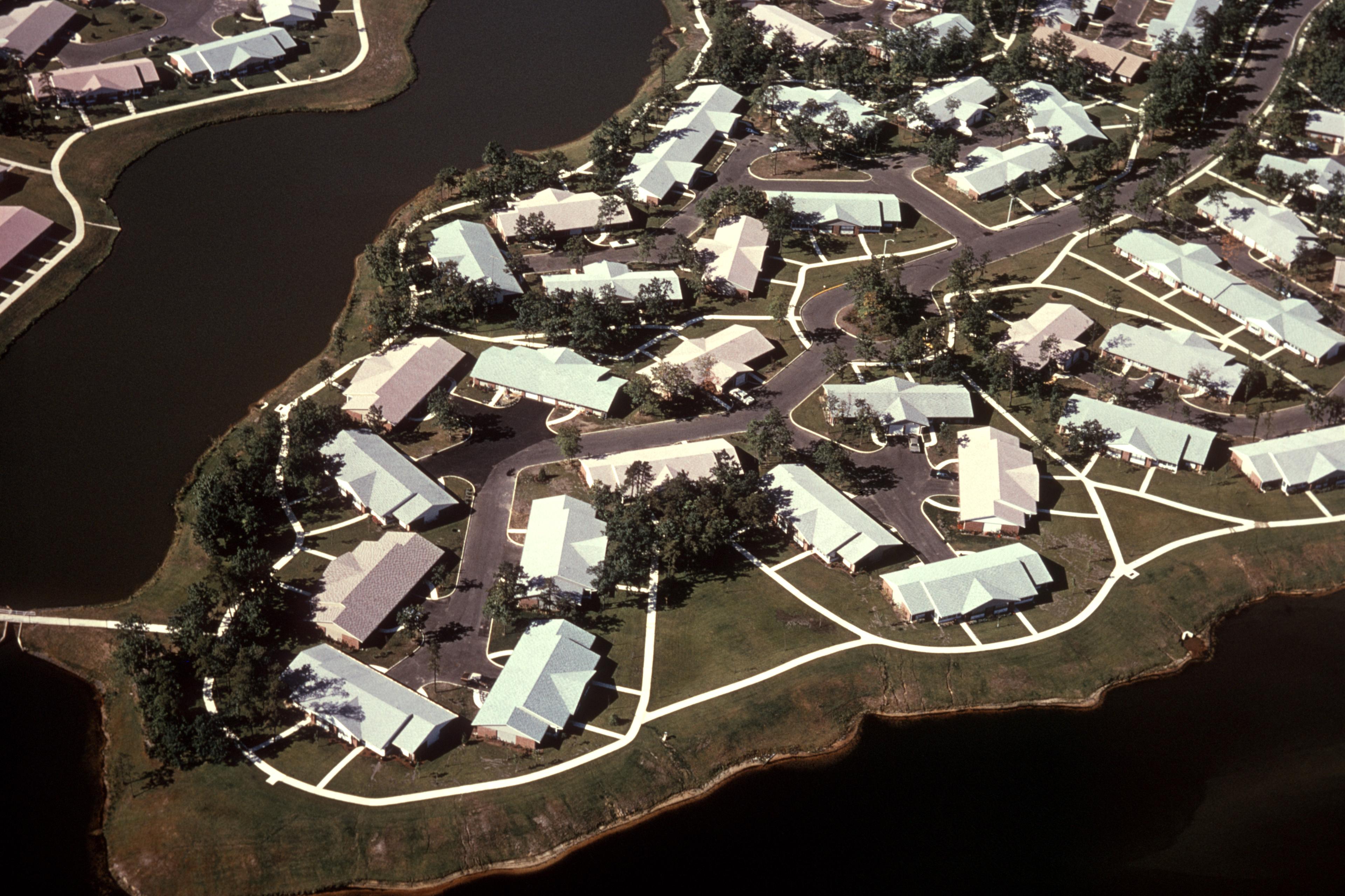 1970s AERIAL VIEW SUBURBAN...